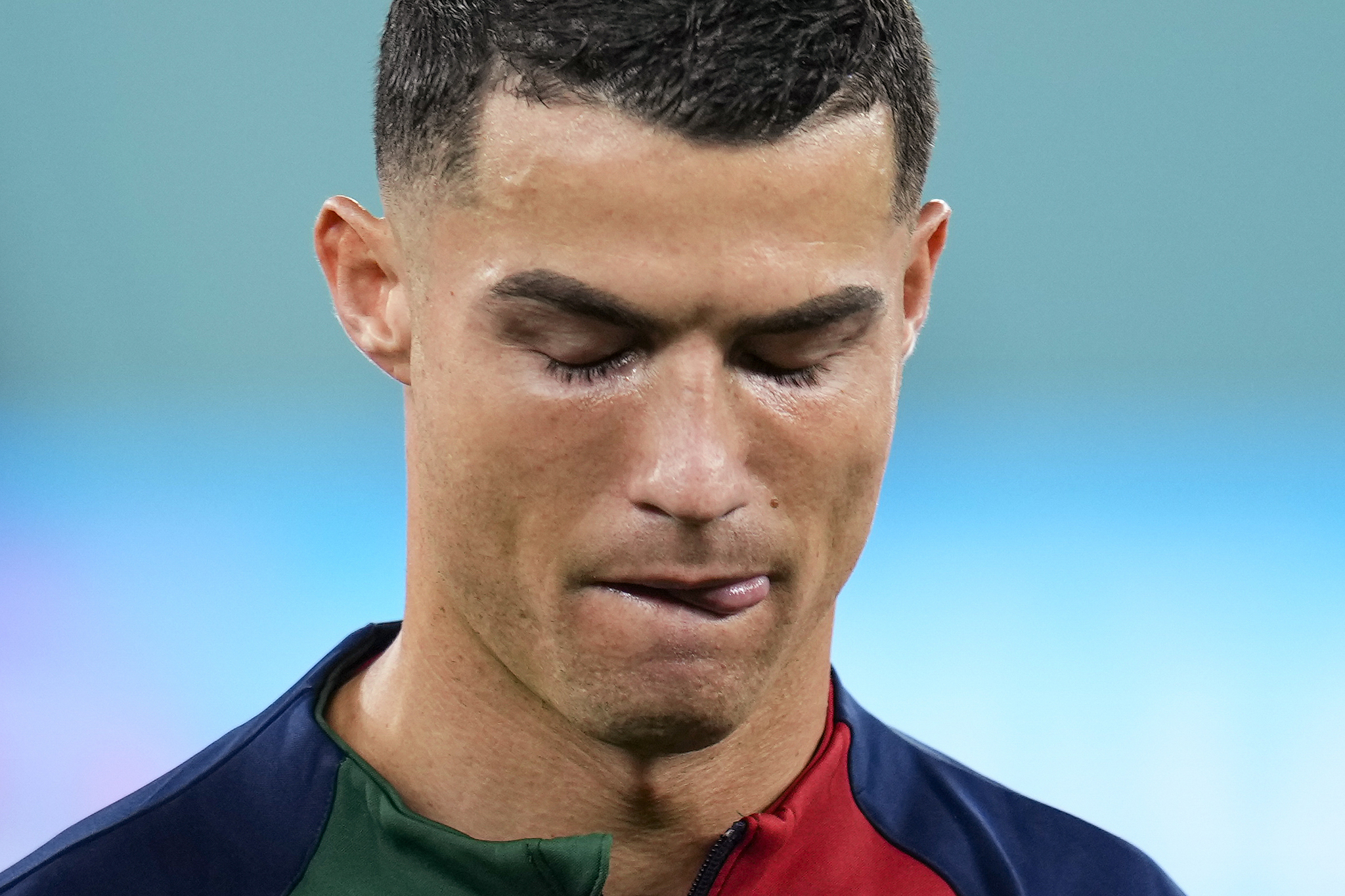 Portugal's  lt;HIT gt;Cristiano lt;/HIT gt;  lt;HIT gt;Ronaldo lt;/HIT gt; reacts while listening to the Portugal's national anthem prior the start of the World Cup group H soccer match between Portugal and Ghana at the Stadium 974 in Doha, Qatar, Thursday, Nov. 24, 2022. (AP Photo/Manu Fernandez)