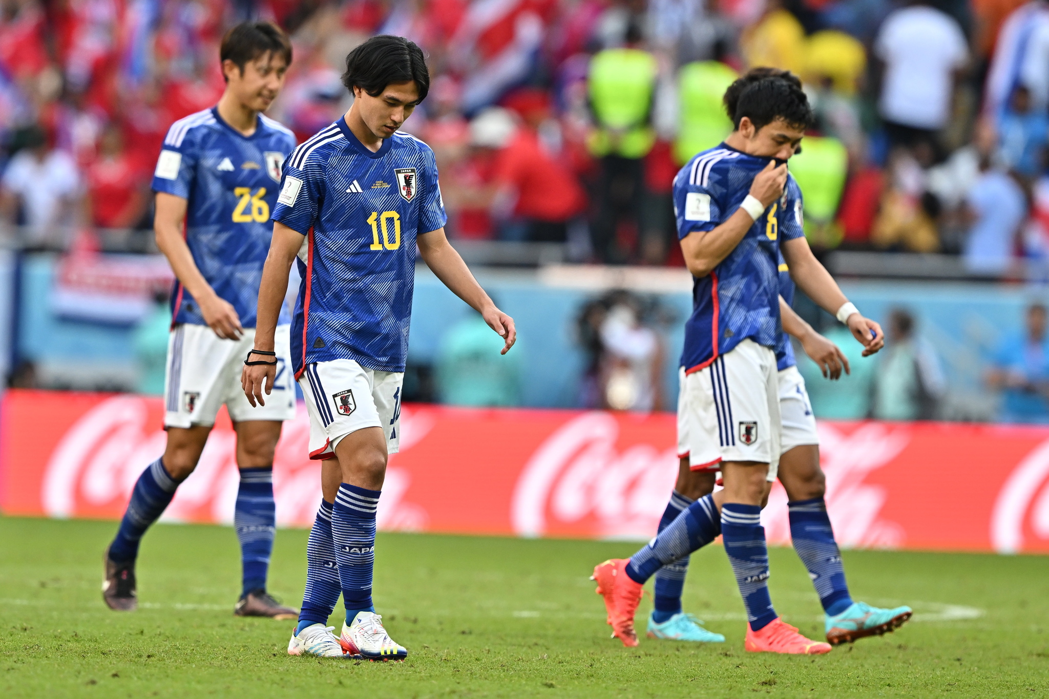 Los jugadores japoneses después de la derrota frente a Costa Rica
