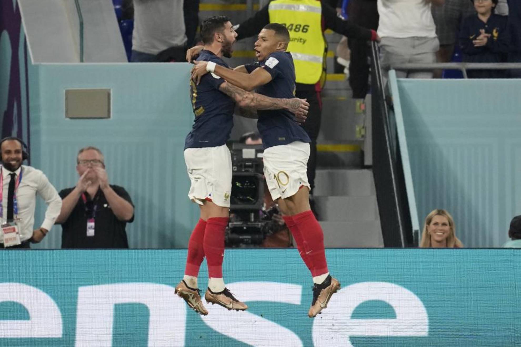 Theo celebrates with Mbappe.