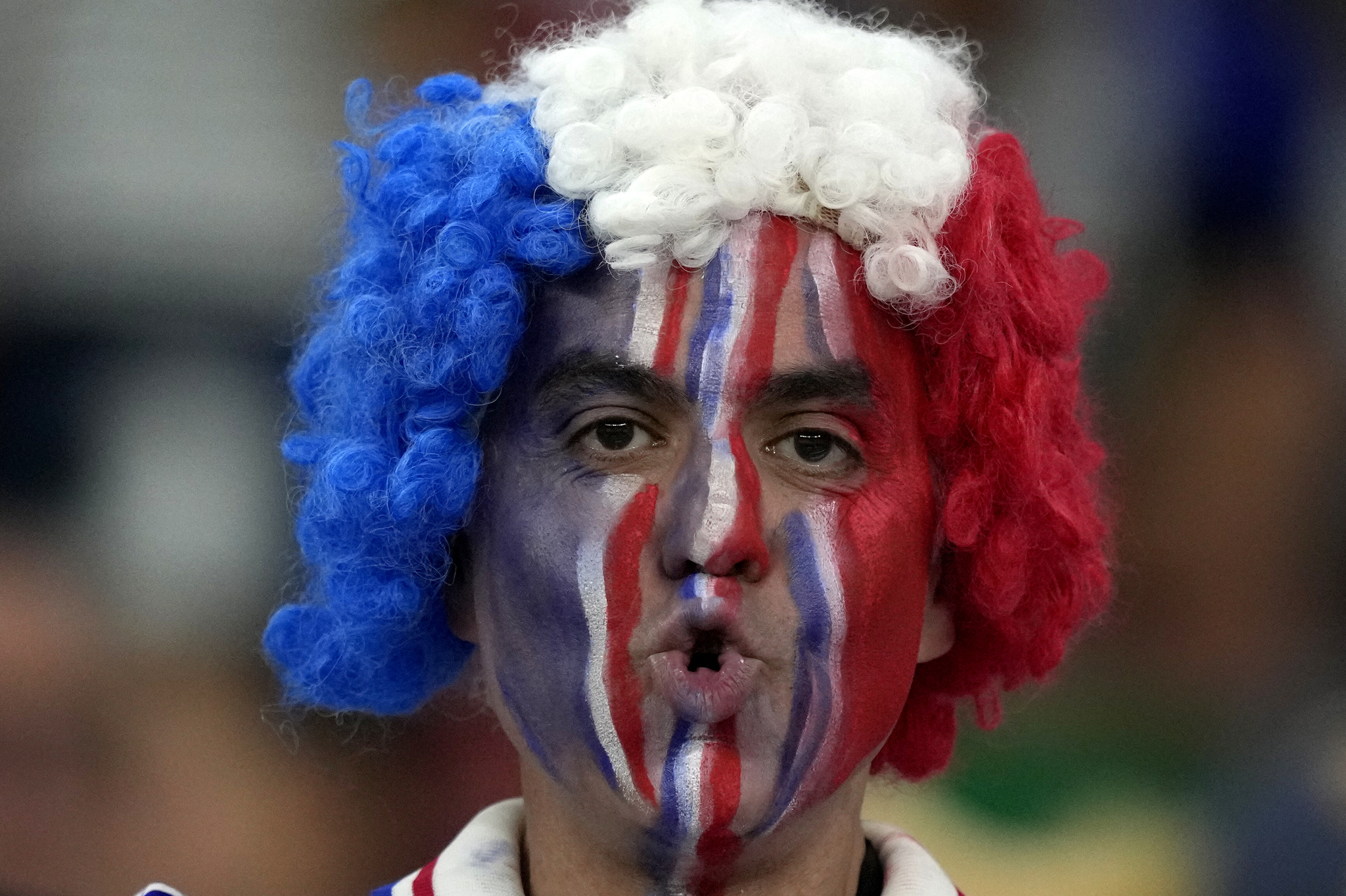 A French soccer fan looks on ahead of the  lt;HIT gt;World lt;/HIT gt;  lt;HIT gt;Cup lt;/HIT gt; group D soccer match between Tunisia and France at the Education City Stadium in Al Rayyan , Qatar, Wednesday, Nov. 30, 2022. (AP Photo/Frank Augstein)