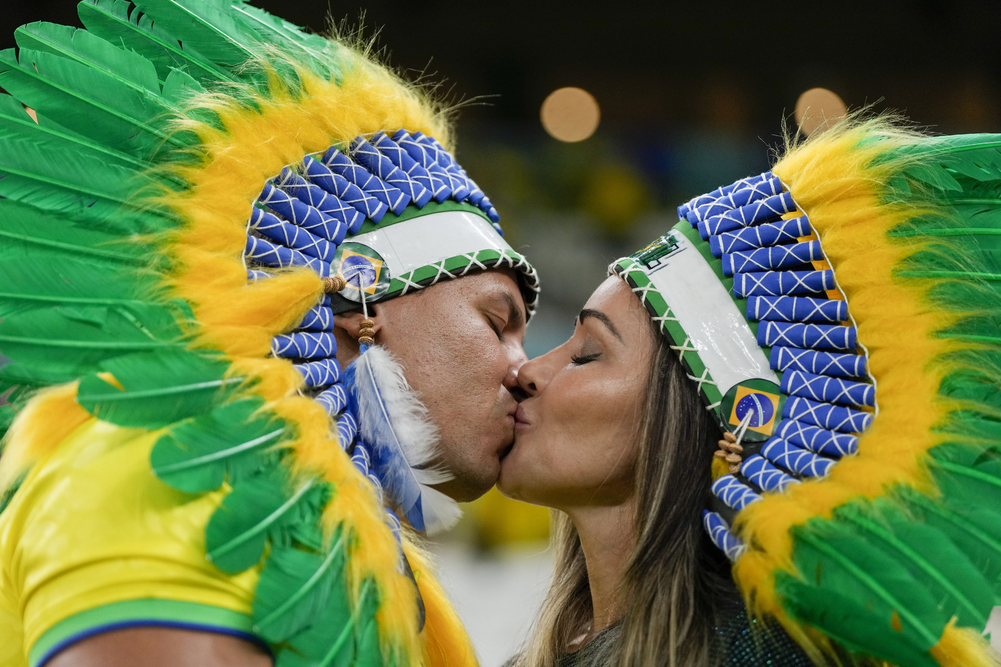  lt;HIT gt;Brazil lt;/HIT gt; soccer team fans kiss ahead of the World Cup group G soccer match between Cameroon and  lt;HIT gt;Brazil lt;/HIT gt;, at the Lusail Stadium in Lusail, Qatar, Friday, Dec. 2, 2022. (AP Photo/Frank Augstein)