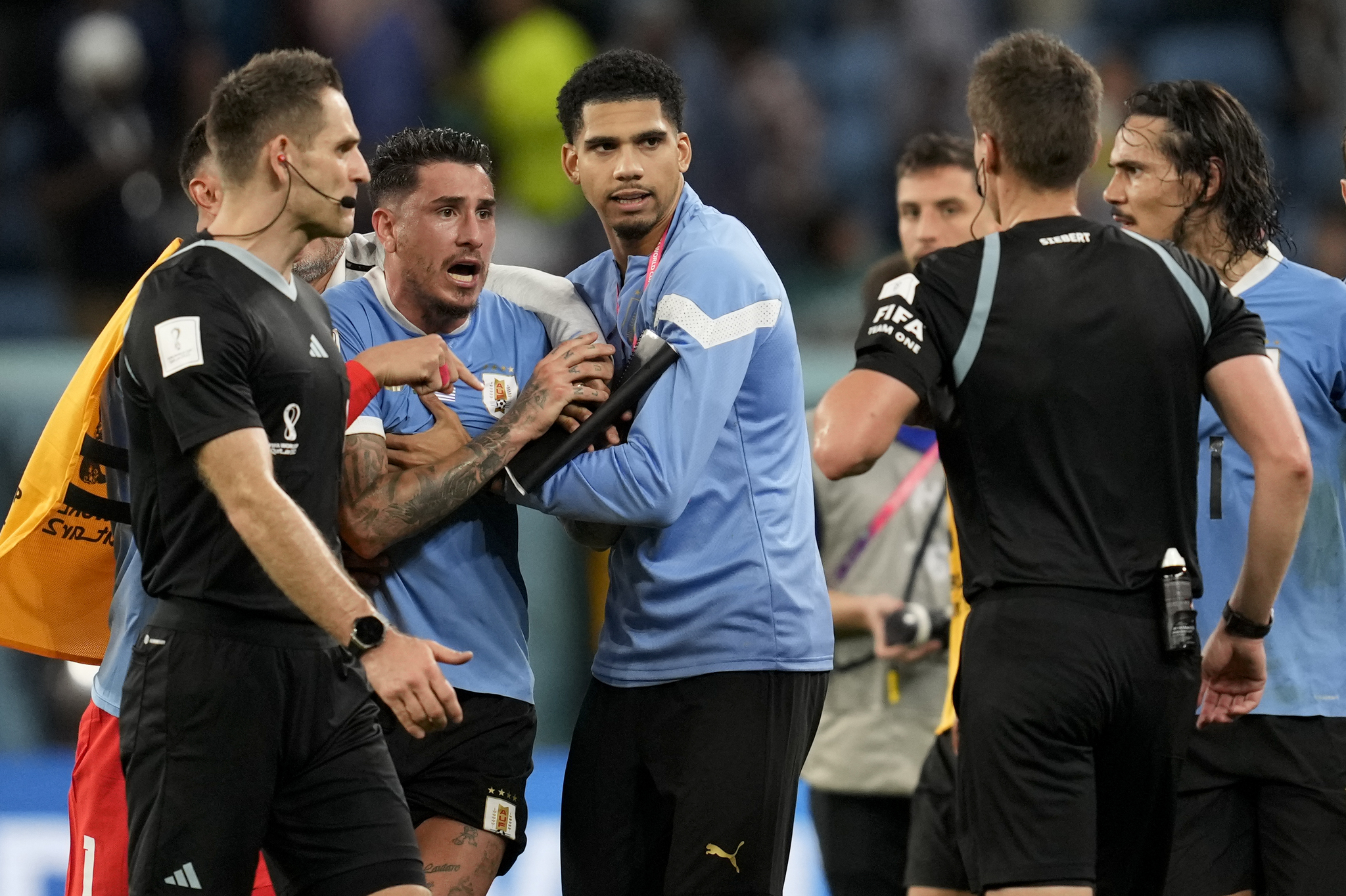  lt;HIT gt;Uruguay lt;/HIT gt;'s Jose Gimenez argues with the referee at the end of a  lt;HIT gt;World lt;/HIT gt;  lt;HIT gt;Cup lt;/HIT gt; group H soccer match against Ghana at the Al Janoub Stadium in Al Wakrah, Qatar, Friday, Dec. 2, 2022. (AP Photo/Darko Vojinovic)