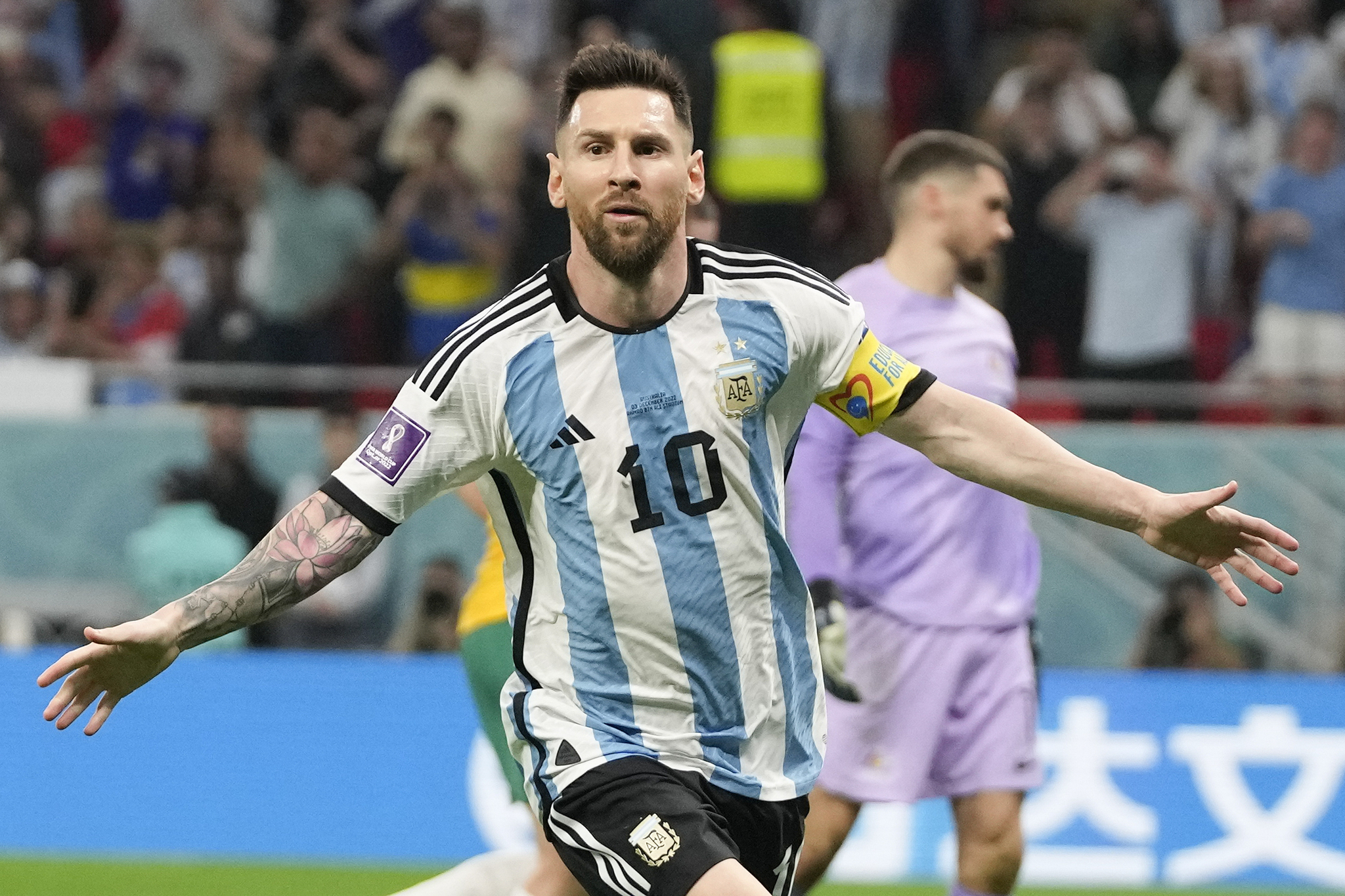 Lionel Messi celebrates scoring 