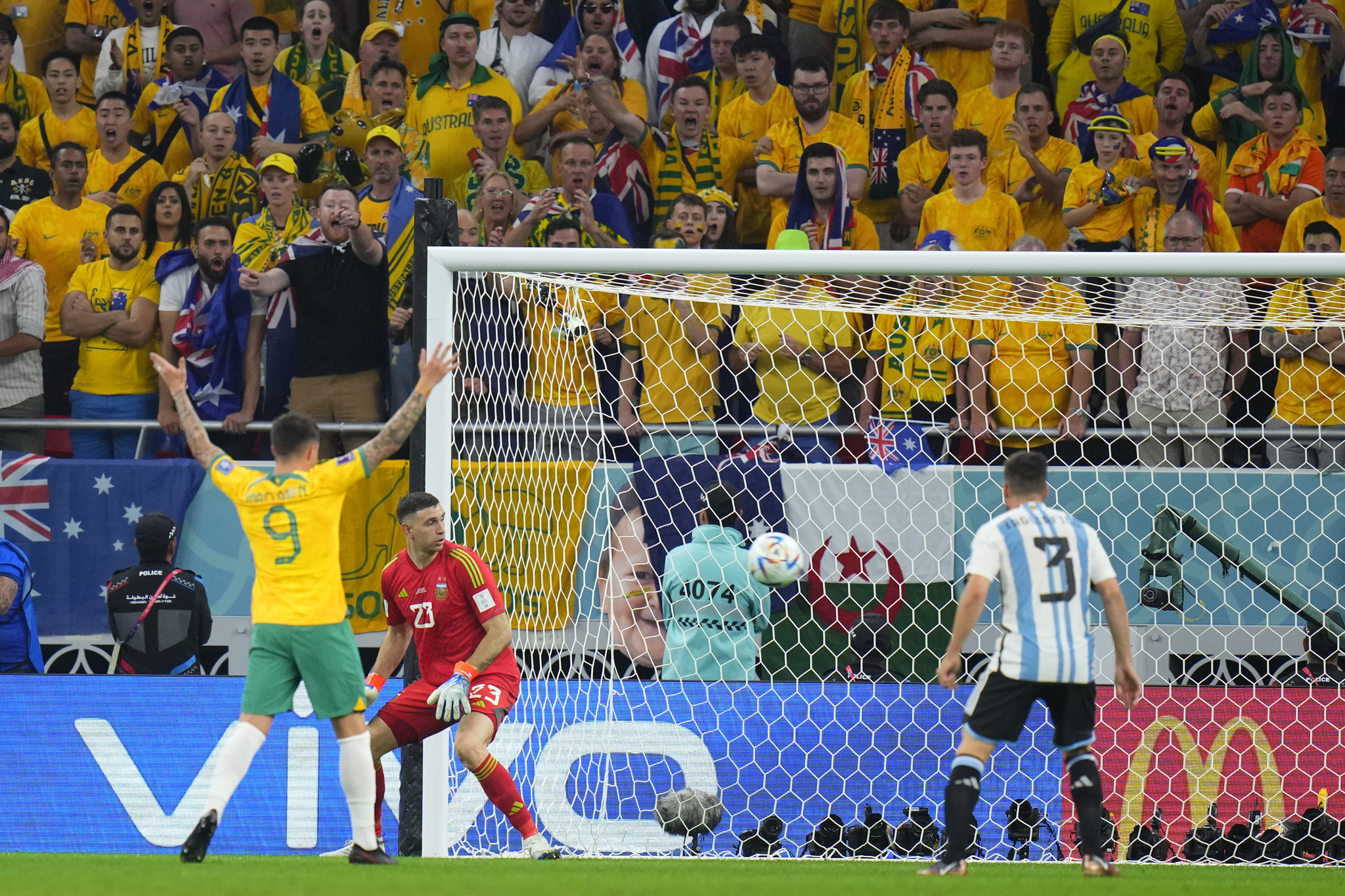 Argentina's goalkeeper Emiliano Martinez reacts as teammate Enzo Fernandez scores an own goal 