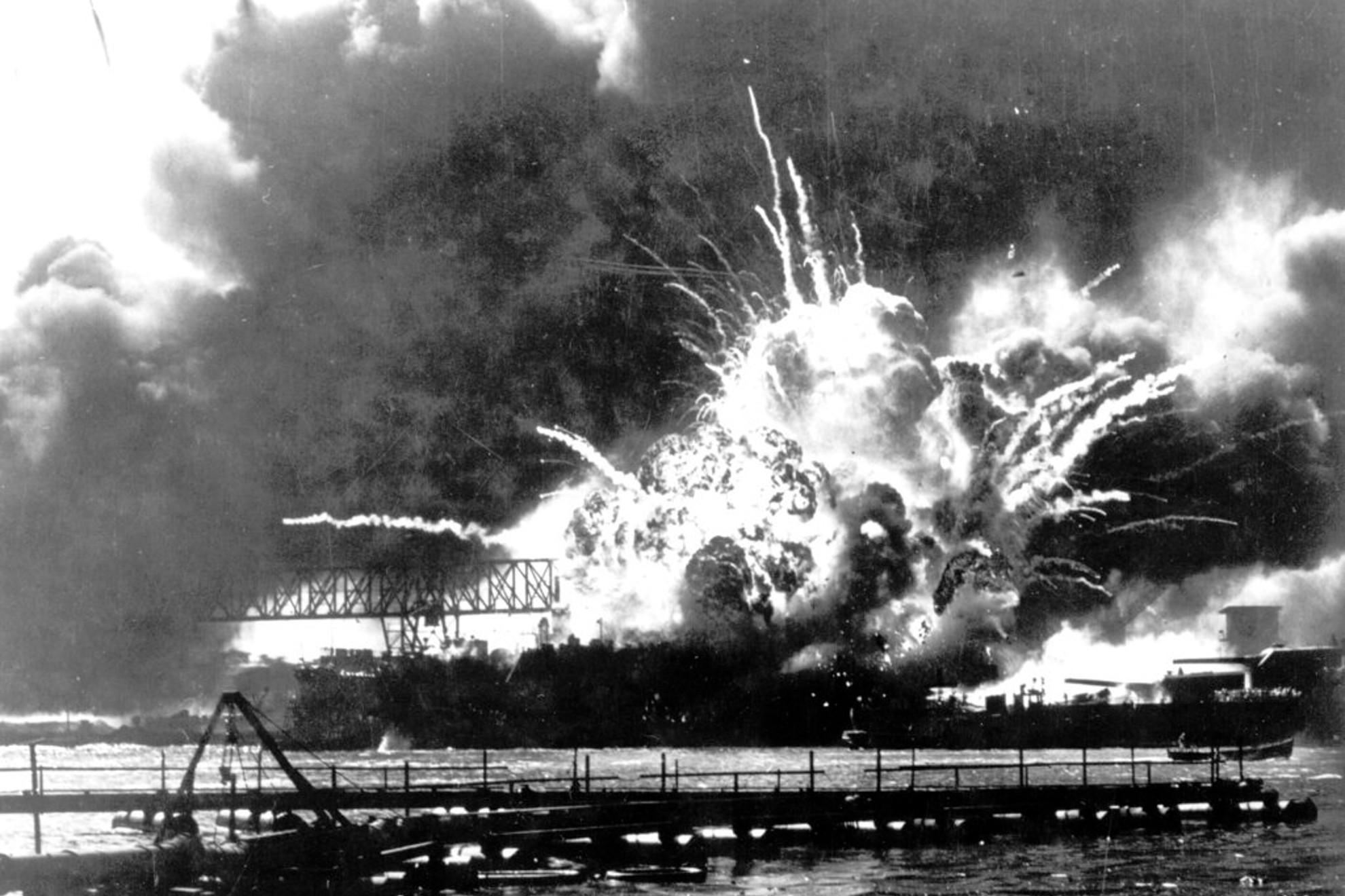 The destroyer USS Shaw explodes after being hit by bombs during the Japanese surprise attack on Pearl Harbor