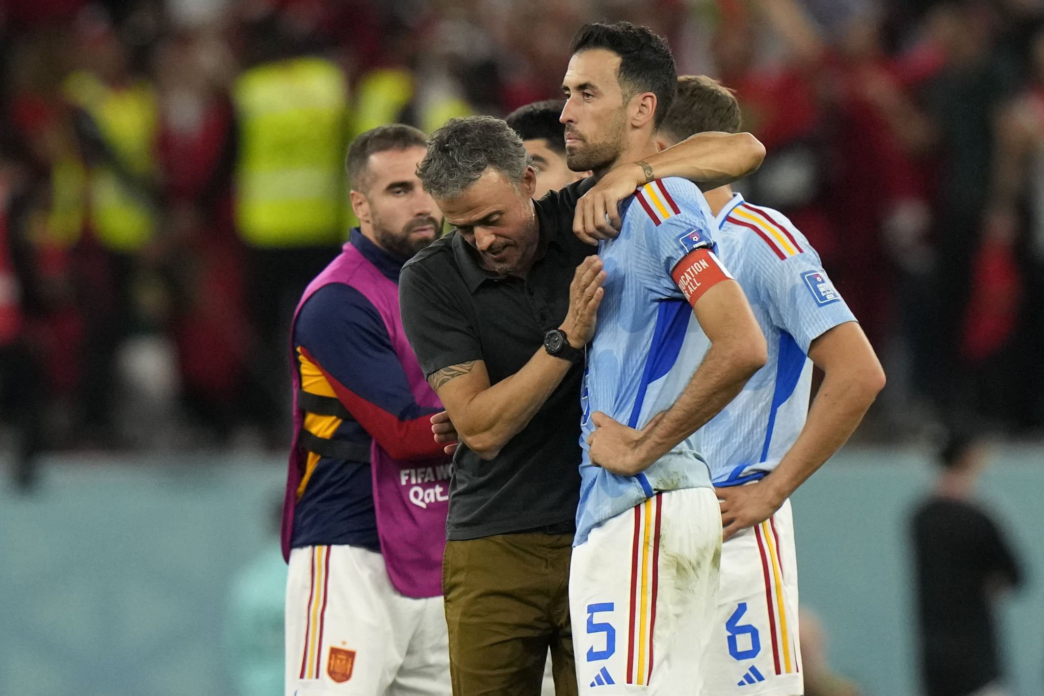 Spain's head coach lt;HIT gt;Luis lt;/HIT gt; lt;HIT gt;Enrique lt;/HIT gt;, left, embraces Sergio Busquets after the penalty shootout at the World Cup round of 16 soccer match between Morocco and Spain, at the Education City Stadium in Al Rayyan, Qatar, Tuesday, Dec. 6, 2022. (AP Photo/Luca Bruno)