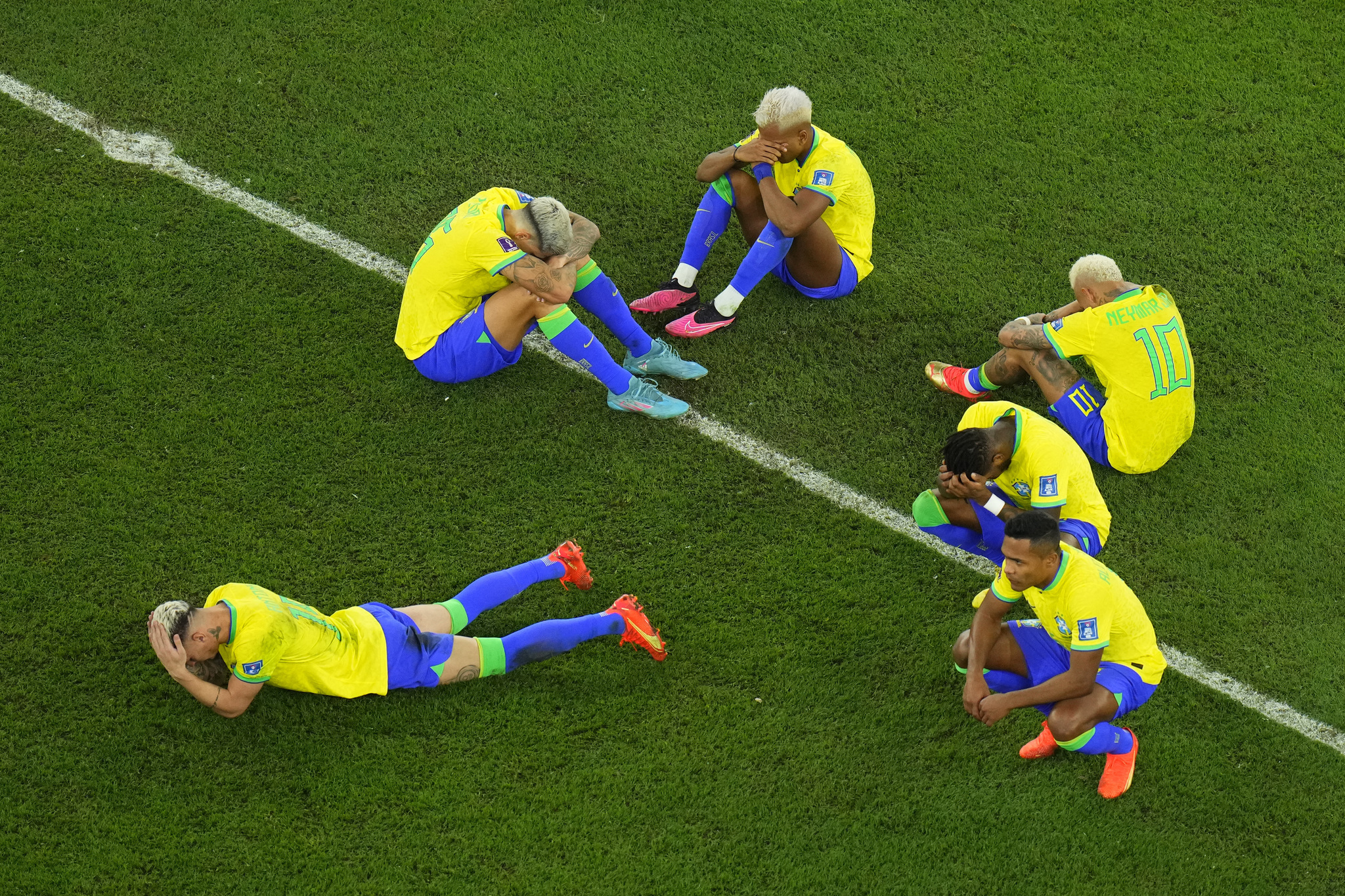 Brazil's players are dejected after losing the World Cup quarterfinal soccer match between  lt;HIT gt;Croatia lt;/HIT gt; and Brazil, at the Education City Stadium in Al Rayyan, Qatar, Friday, Dec. 9, 2022. (AP Photo/Petr David Josek)