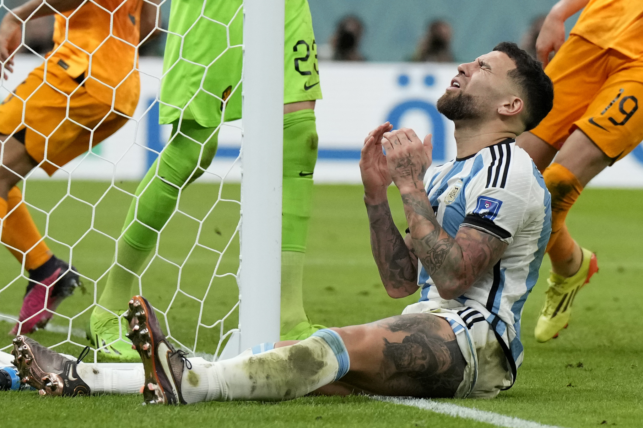  lt;HIT gt;Argentina lt;/HIT gt;'s Nicolas Otamendi reacts after a missed chance to score during the World Cup quarterfinal soccer match between the Netherlands and  lt;HIT gt;Argentina lt;/HIT gt;, at the Lusail Stadium in Lusail, Qatar, Saturday, Dec. 10, 2022. (AP Photo/Ricardo Mazalan)