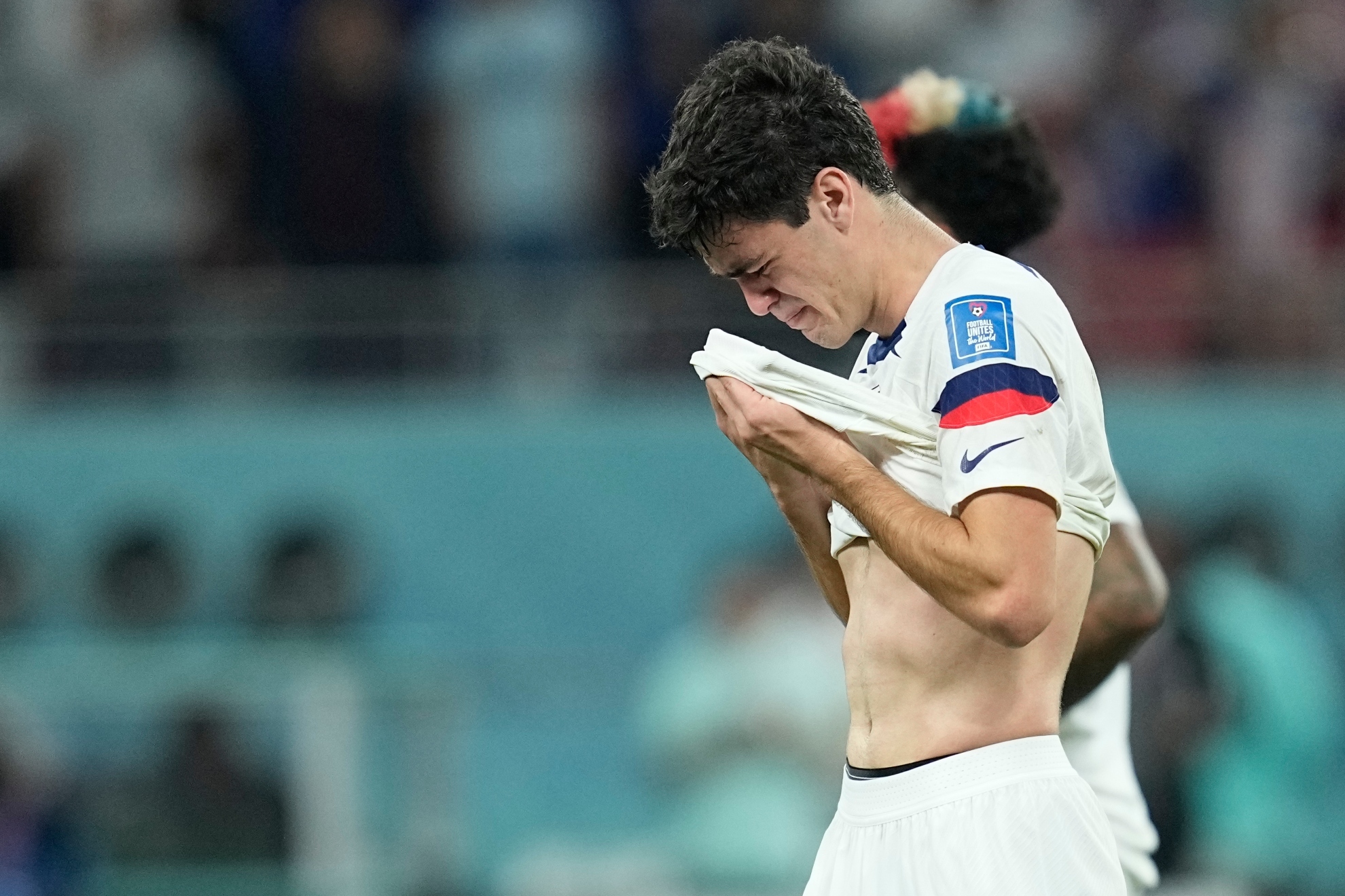 Gio Reyna of the United States is dejected after the World Cup round of 16 soccer match between the Netherlands and the United States