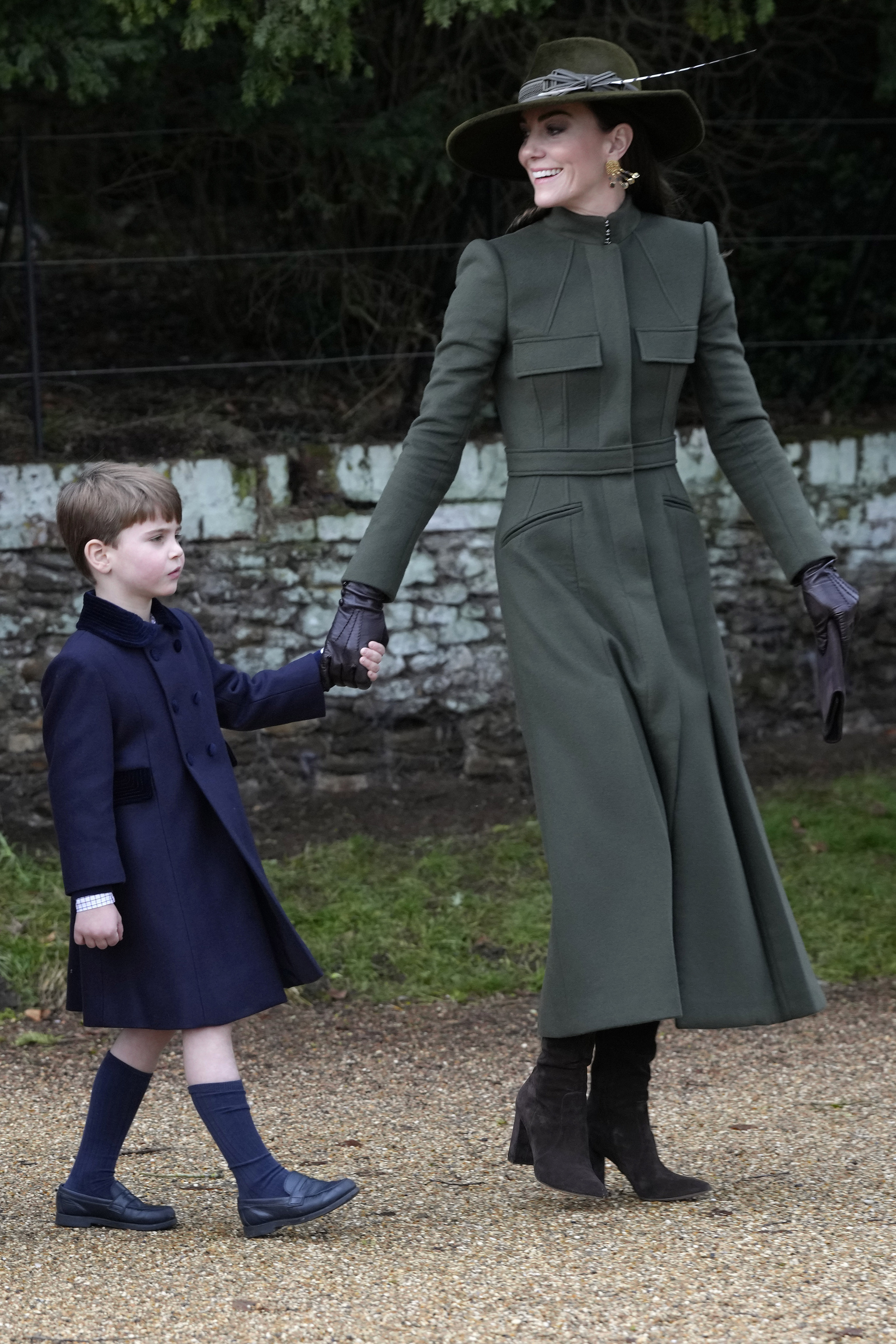 Prince Louis and Kate, Princess of Wales leave after attending the Christmas day service at St Mary Magdalene Church