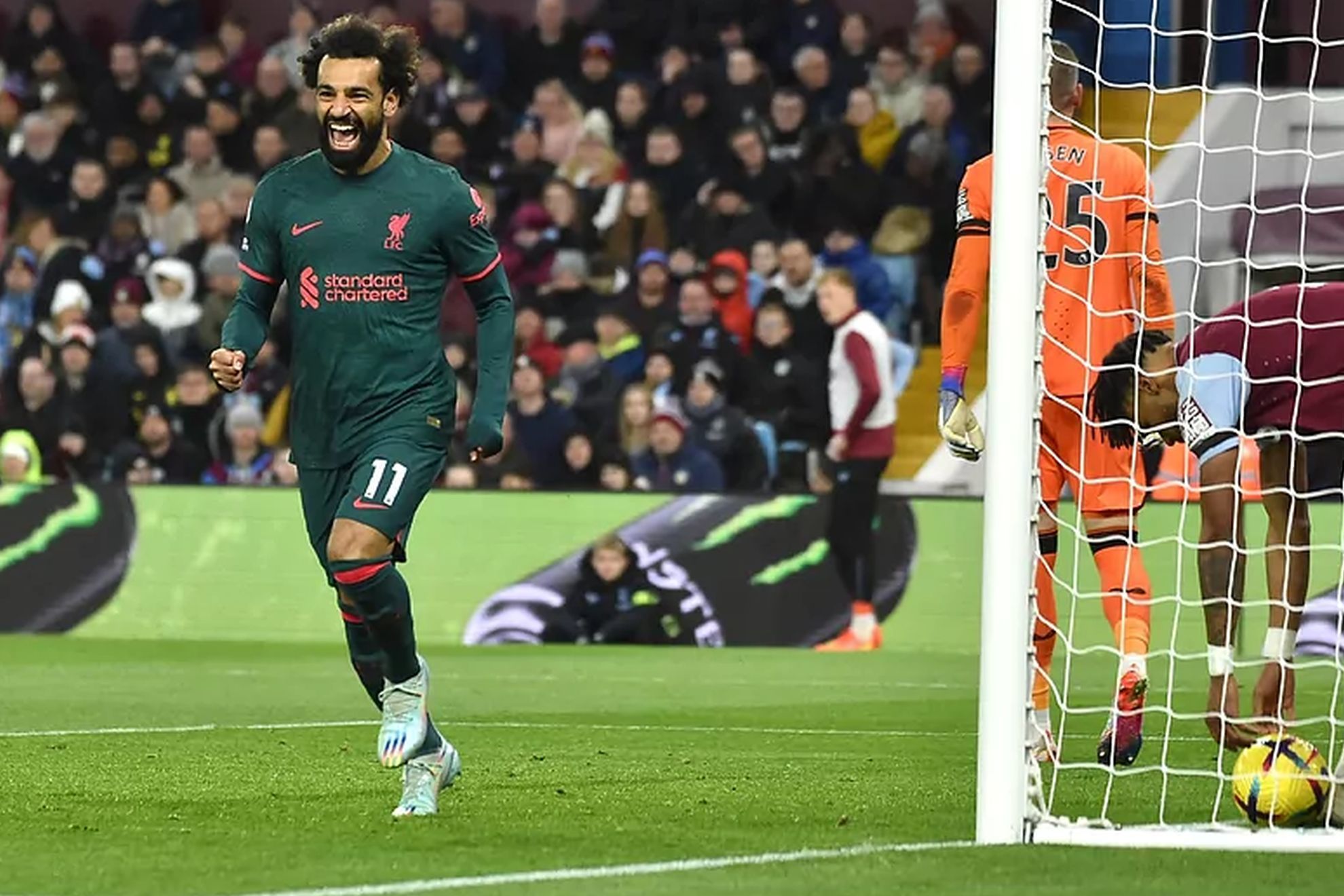 Mohamed Salah celebrates a goal against Aston Villa