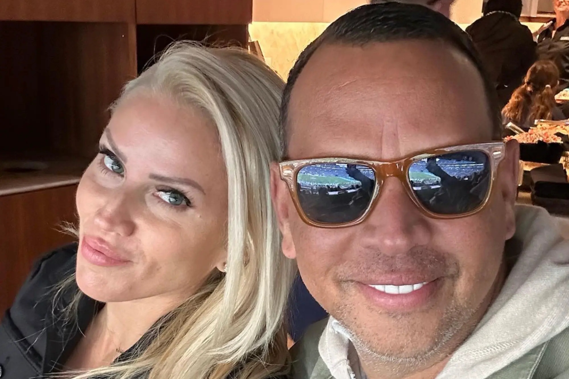 Jac Cordeiro and Alex Rodriguez attend the Dolphins-Packers game on Dec. 25, 2022
