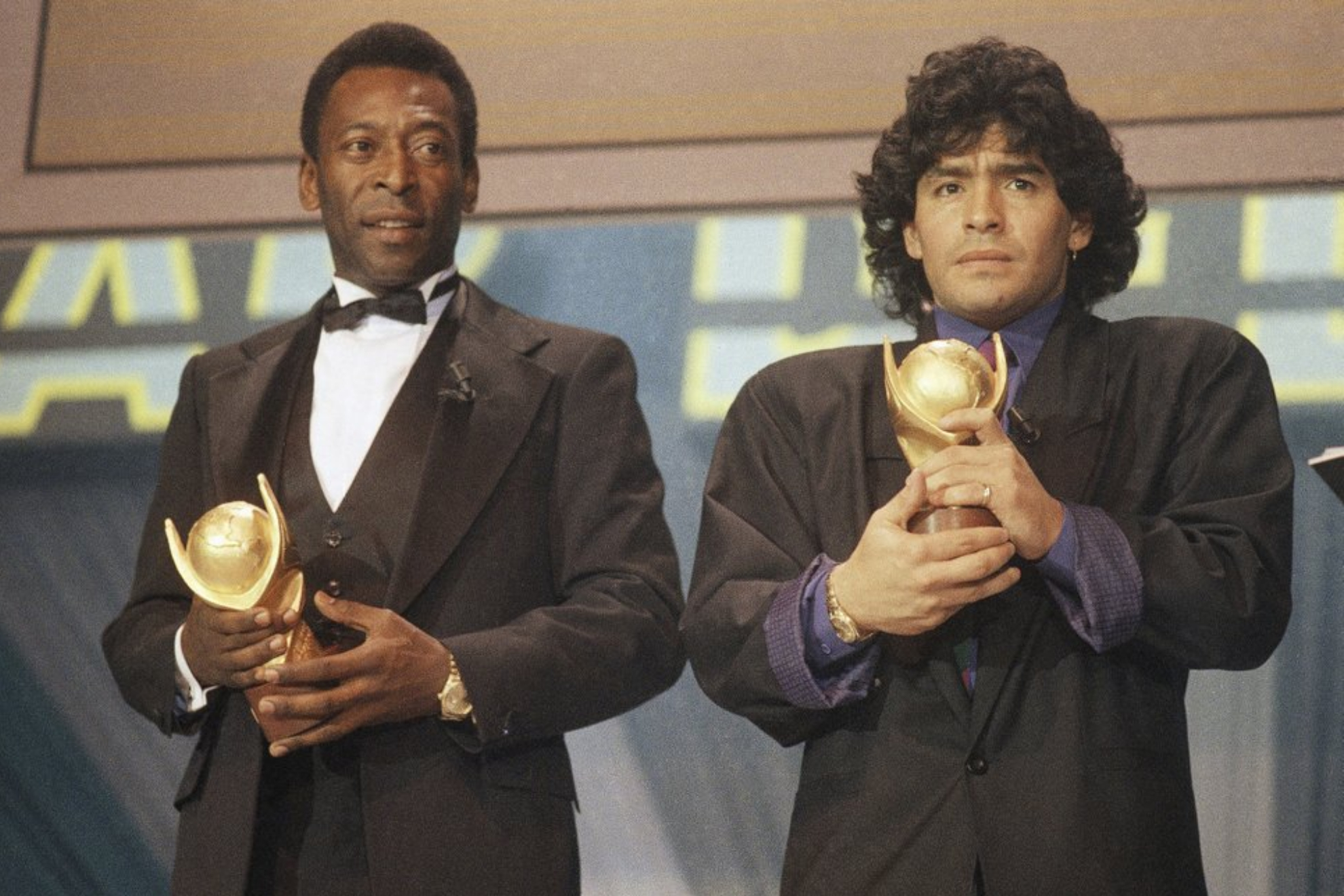 Pele and Maradona during an award ceremony in Italy.