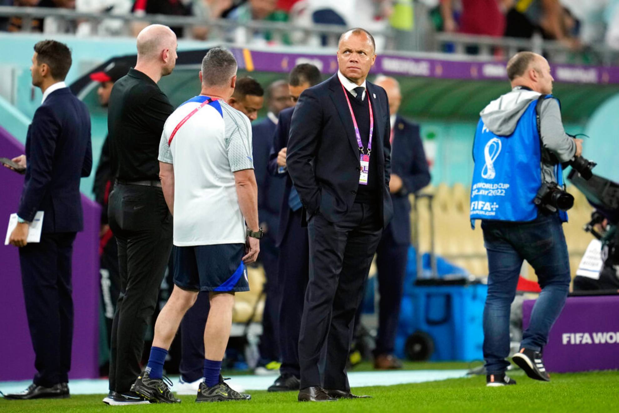 U.S. Soccer Federation sporting director Earnie Stewart stands on the field before the World Cup group B soccer match between Iran and the United States at the Al Thumama Stadium in Doha