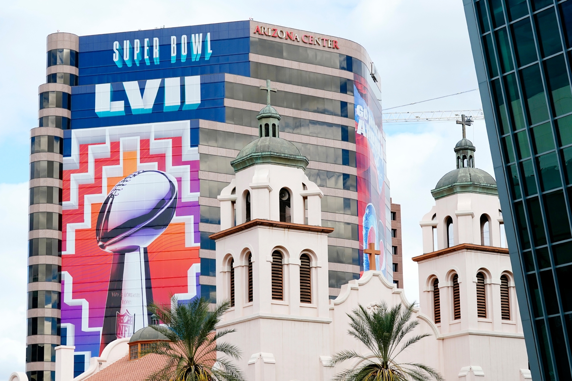 Large Super Bowl signs are on full display, dwarfing St. Mary's Basilica, leading up to the NFL Super Bowl LVII