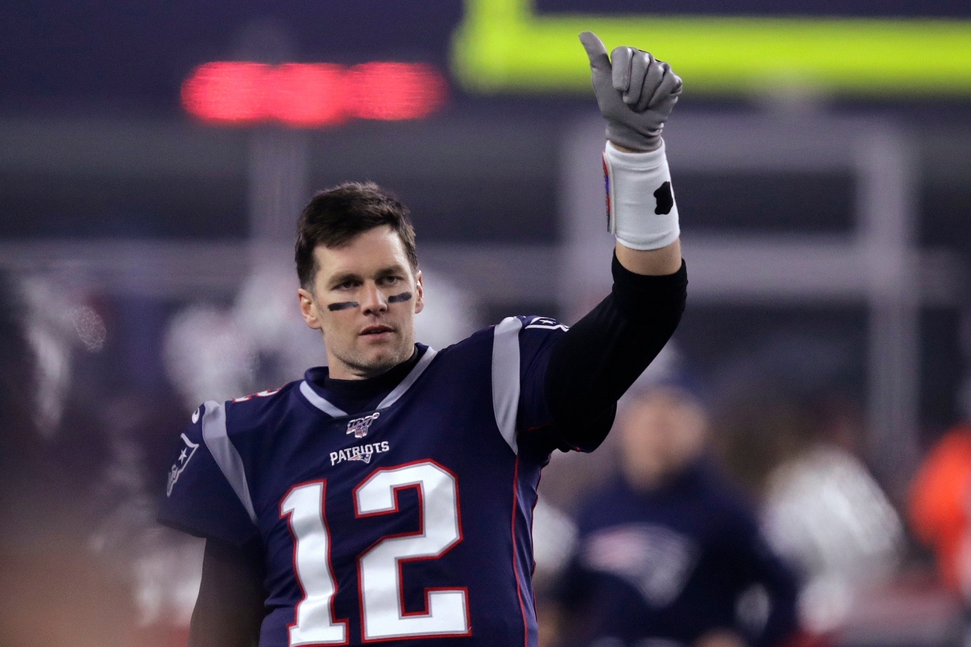 Tom Brady wearing the New England Patriots uniform.