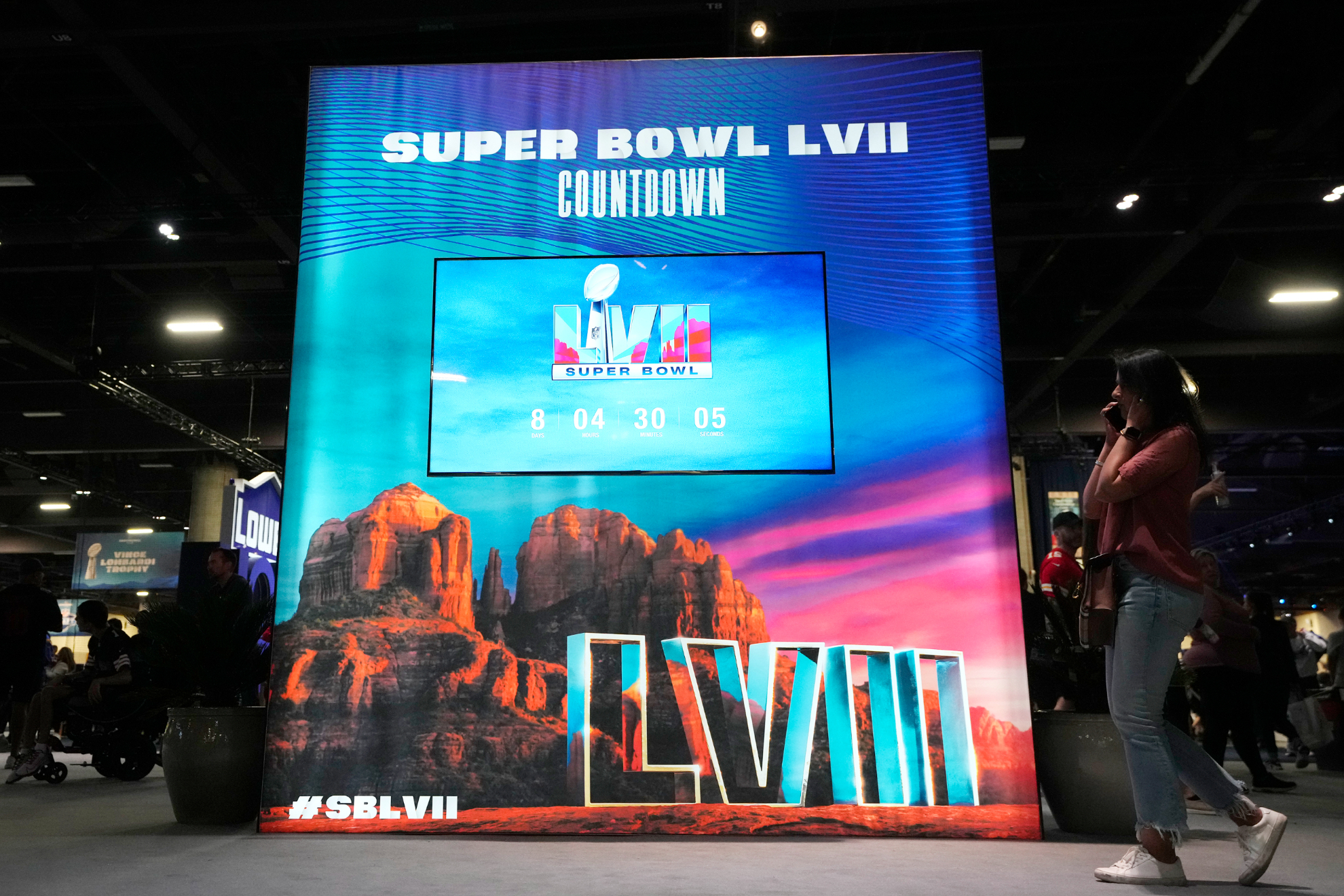 The countdown clock to the big game ticks down at the Super Bowl Experience