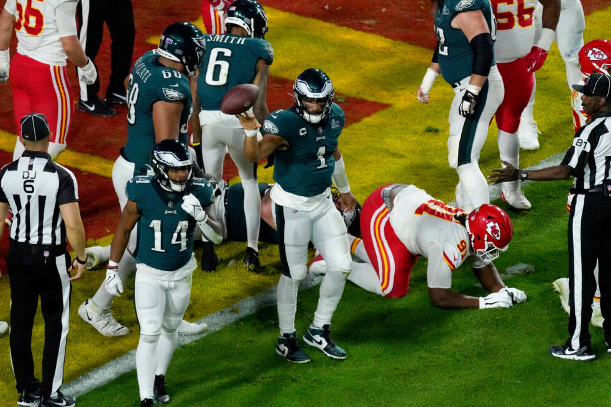 Philadelphia Eagles quarterback Jalen Hurts (1) tosses the ball after his touchdown against the Kansas City Chiefs /