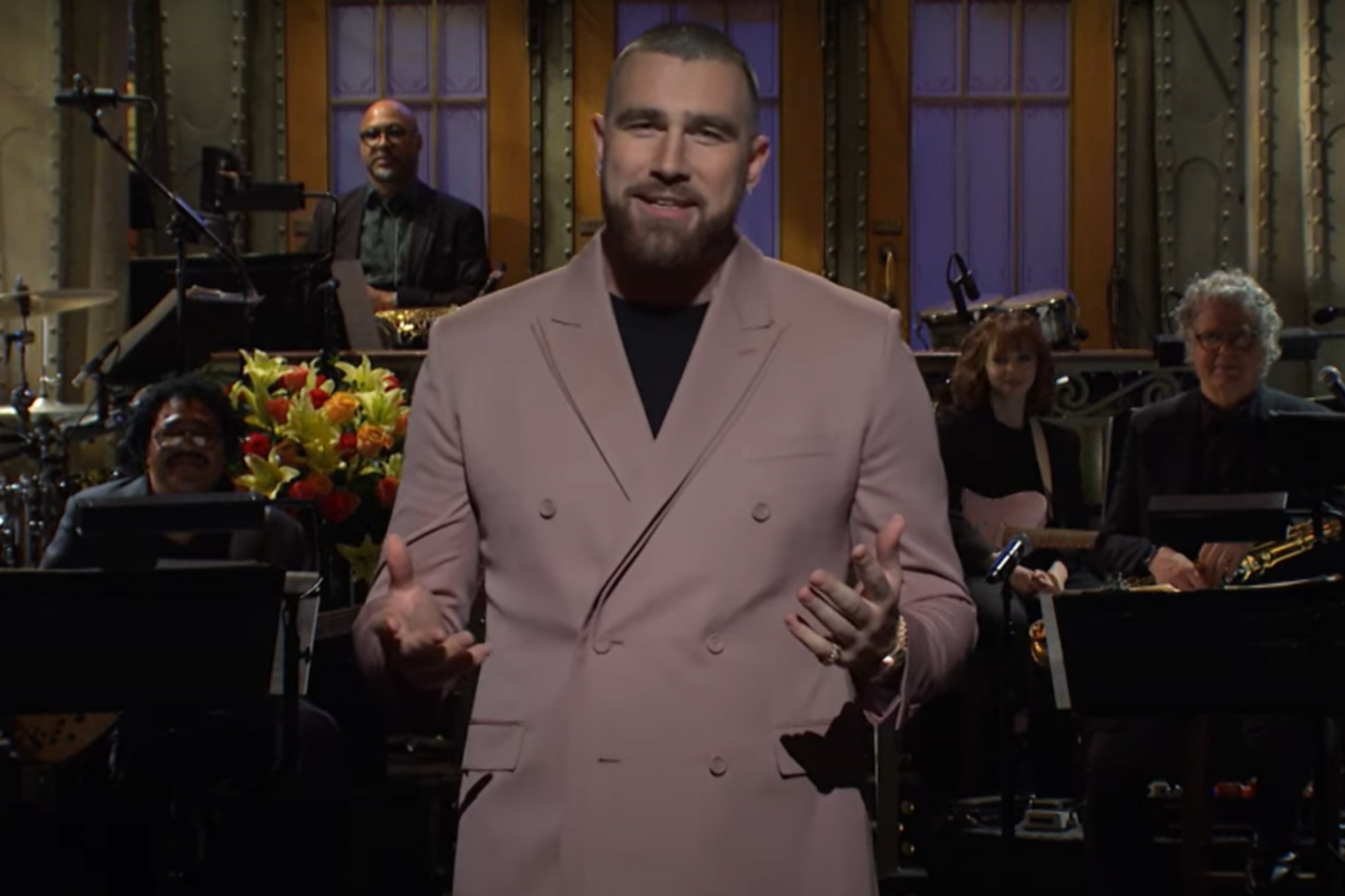 Travis Kelce makes fun of his failed dating show and mocks Patrick Mahomes during SNL monologue