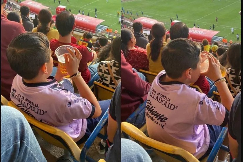 Kid drinks beer at stadium in Mexico.