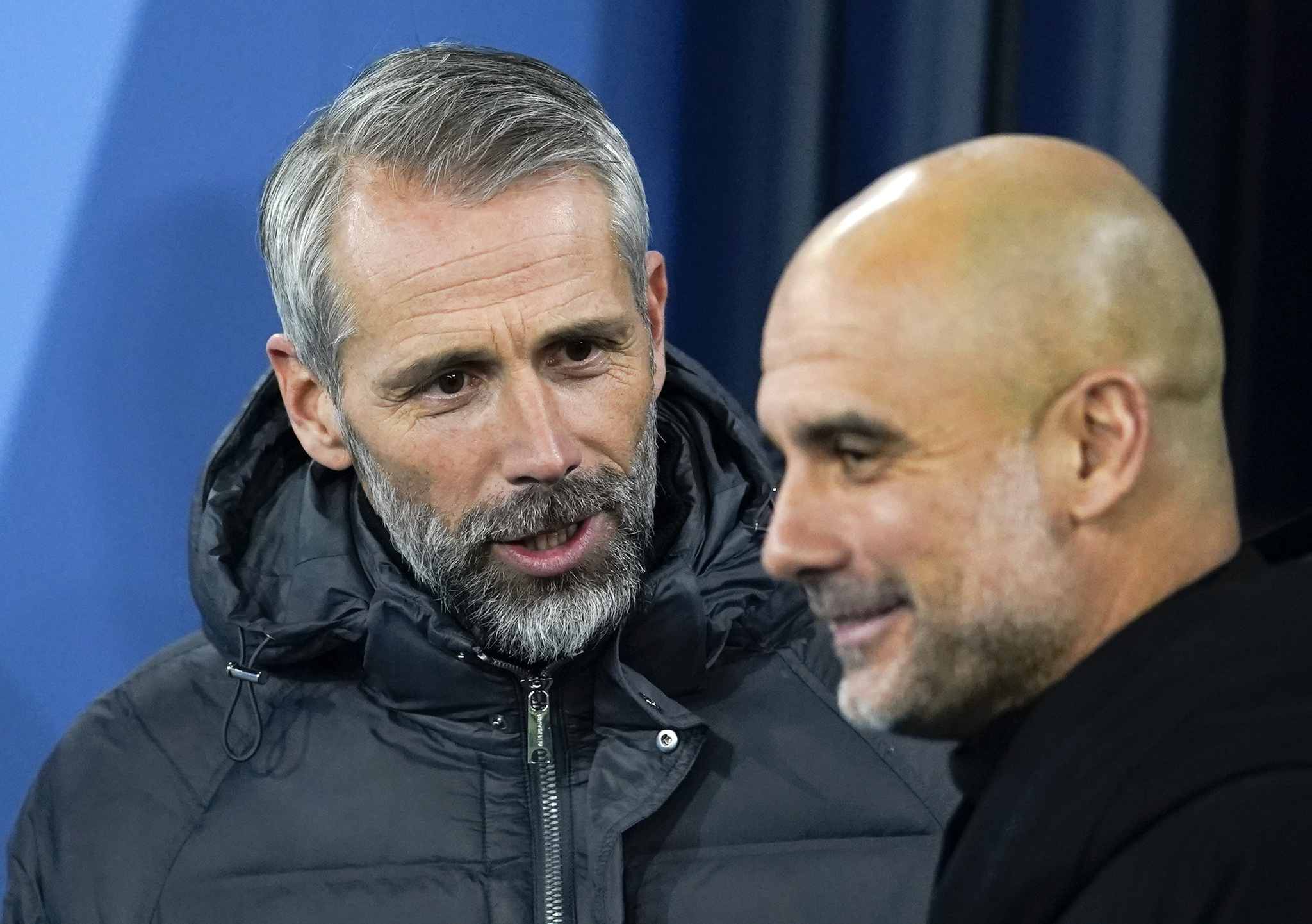 Leipzig's head coach Marco Rose, left, talks to  lt;HIT gt;Manchester lt;/HIT gt; City's head coach Pep Guardiola ahead of the Champions League round of 16 second leg soccer match between  lt;HIT gt;Manchester lt;/HIT gt; City and RB Leipzig at the Etihad stadium in  lt;HIT gt;Manchester lt;/HIT gt;, England, Tuesday, March 14, 2023. (AP Photo/Dave Thompson)