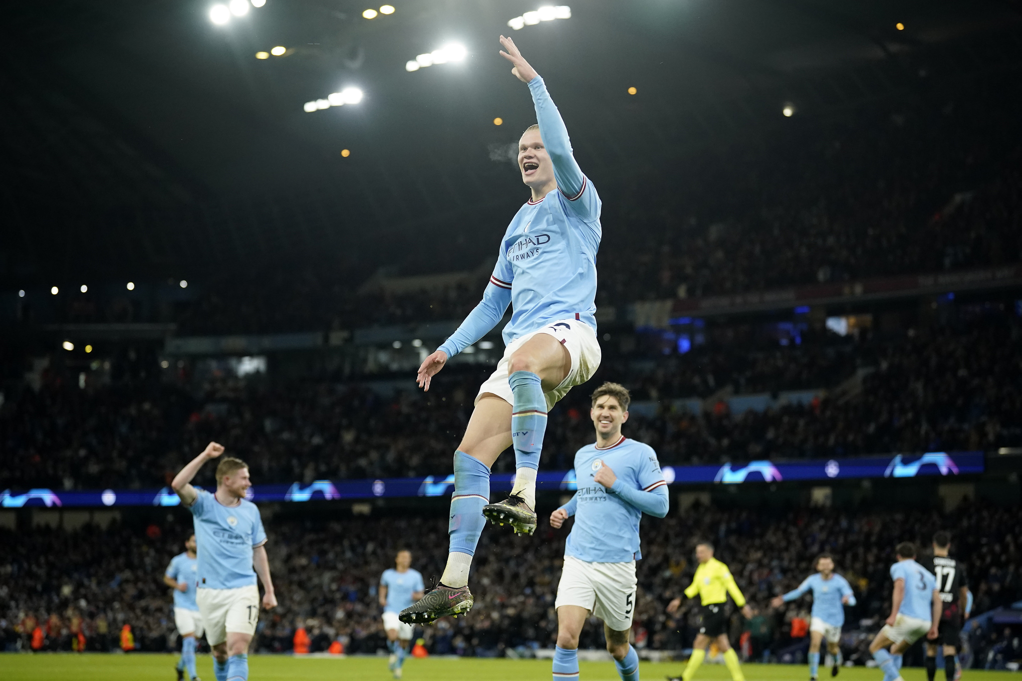 Manchester City's Erling  lt;HIT gt;Haaland lt;/HIT gt; celebrates after scoring his side's 5th goal during the Champions League round of 16 second leg soccer match between Manchester City and RB Leipzig at the Etihad stadium in Manchester, England, Tuesday, March 14, 2023. (AP Photo/Dave Thompson)