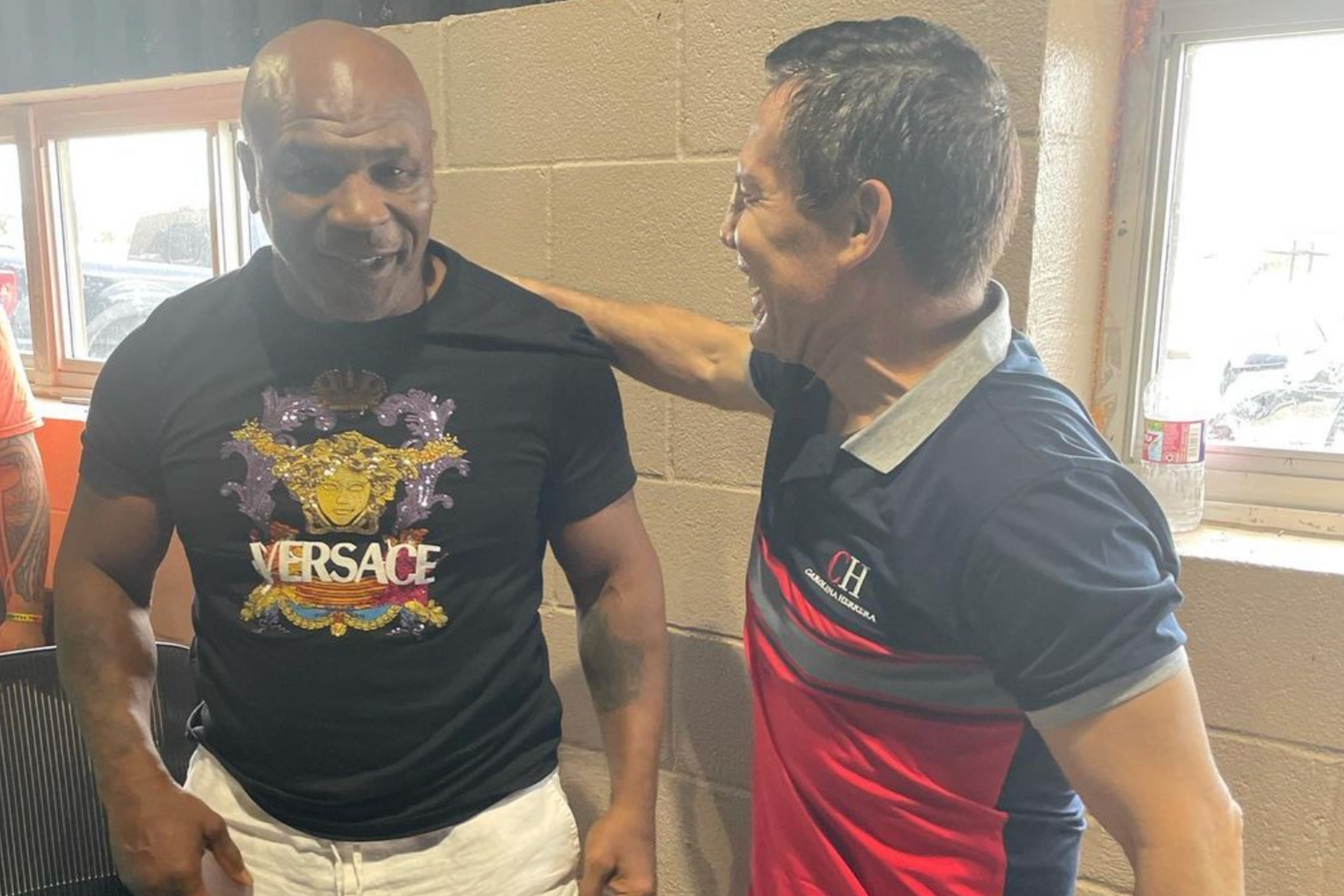 Image of Mike Tyson and Julio Cesar Chavez hanging out.