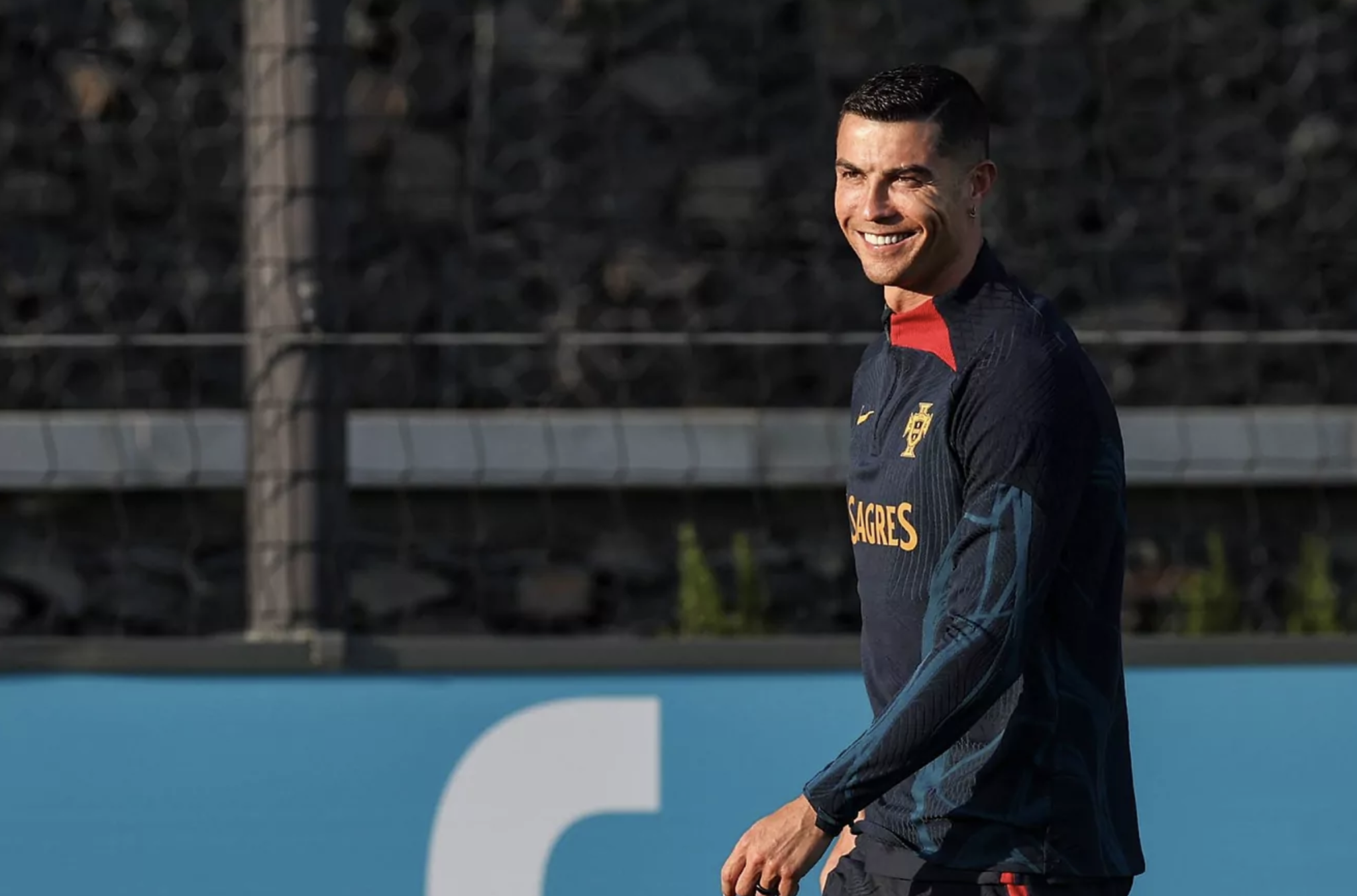 Cristiano Ronaldo smiles in training with Portugal