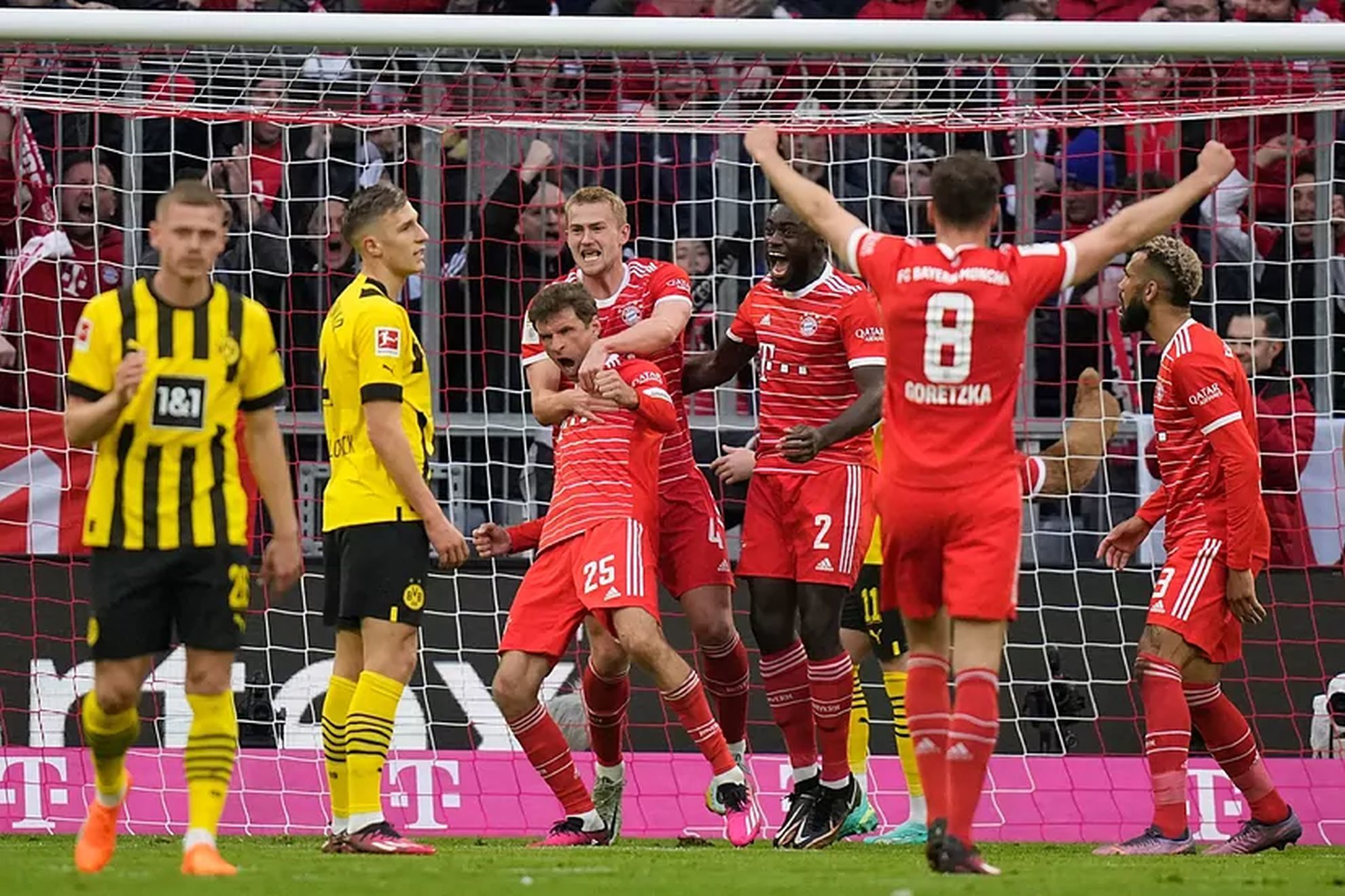 Bayern Munich celebrate a goal against Borussia Dortmund