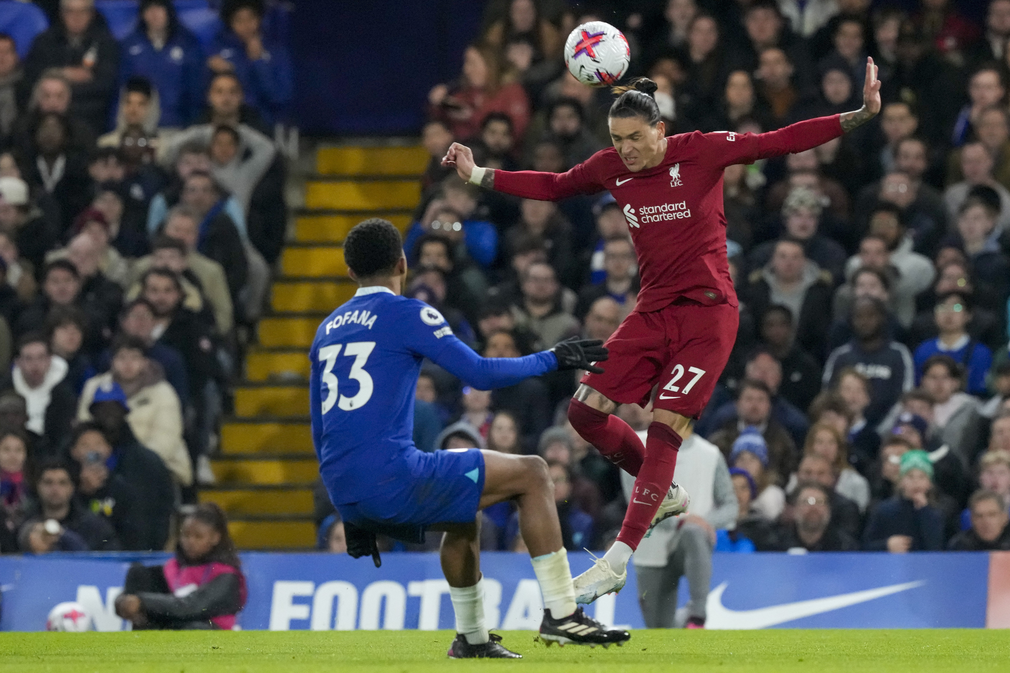 Liverpool's Darwin Nunez, right, duels for the ball with  lt;HIT gt;Chelsea lt;/HIT gt;'s Wesley Fofana during the English Premier League soccer match between  lt;HIT gt;Chelsea lt;/HIT gt; and Liverpool at Stamford Bridge stadium in London, Tuesday, April 4, 2023. (AP Photo/Frank Augstein)