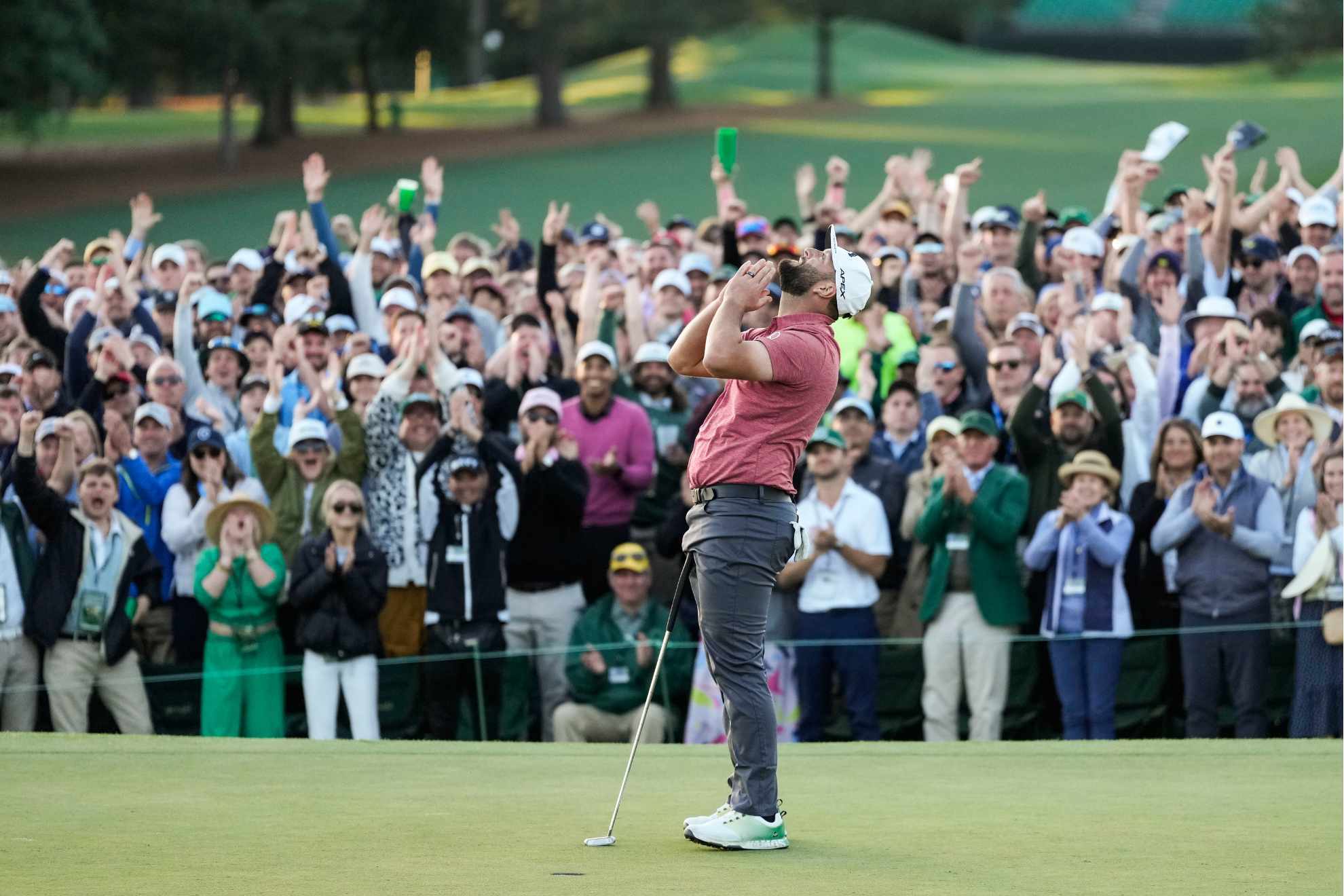 Jon Rahm, of Spain, celebrates on the 18th green after wining the Masters golf tournament at Augusta National Golf Club on Sunday, April 9, 2023, in Augusta, Ga.
