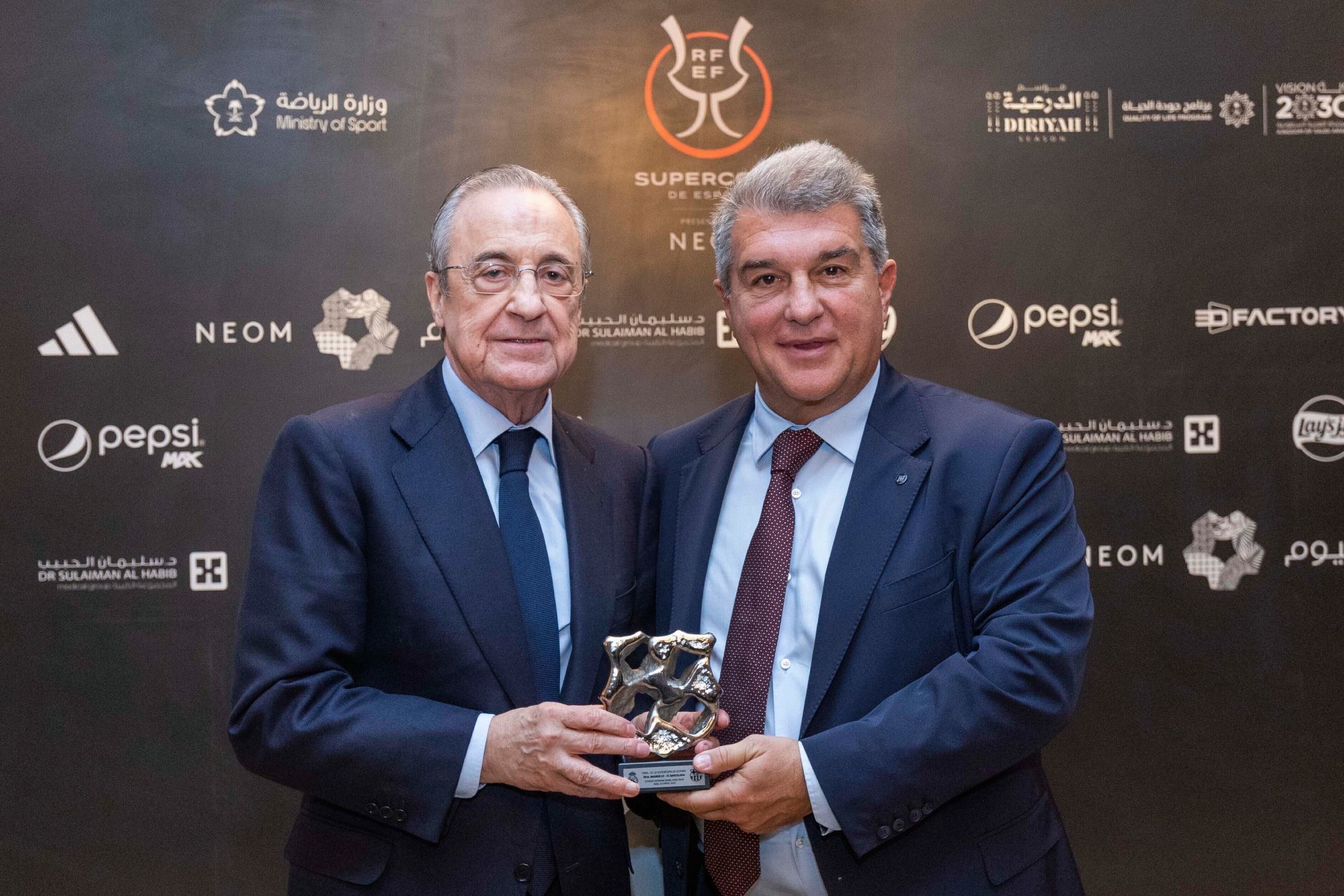 Florentino Prez y Joan Laporta, en la Supercopa de Espaa.