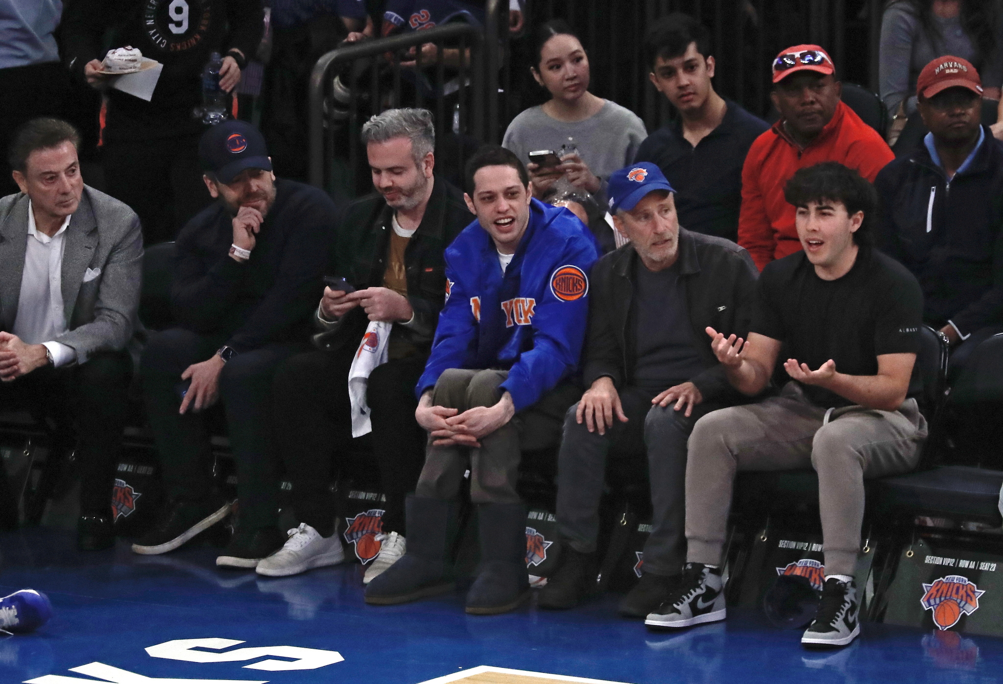 Pete Davidson attends an NBA game with friends