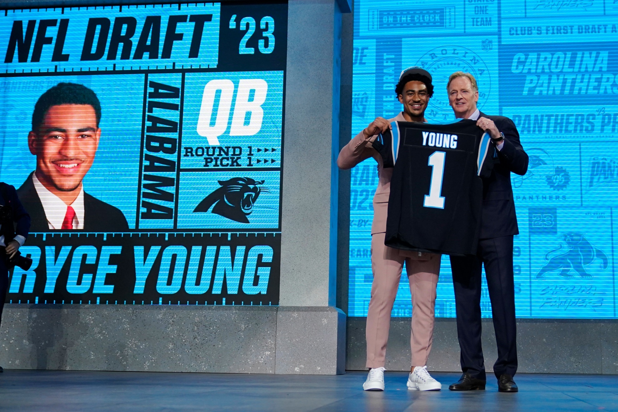 Quarterback Bryce Young and NFL Commissioner Roger Goodell.