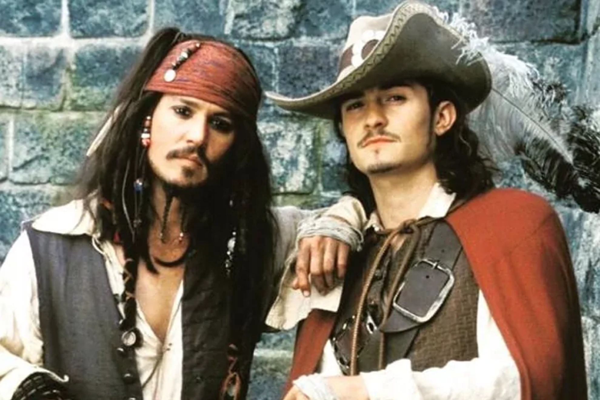 Johnny Depp and Orlando Bloom in the Pirates of the Caribbean franchise.