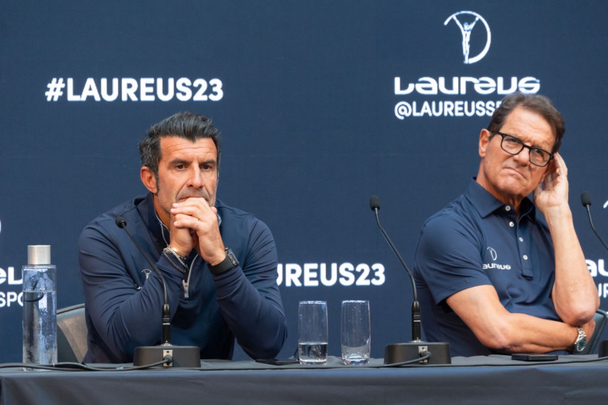 Luis Figo y Fabio Capello, durante la intervenci�n con Laureus.