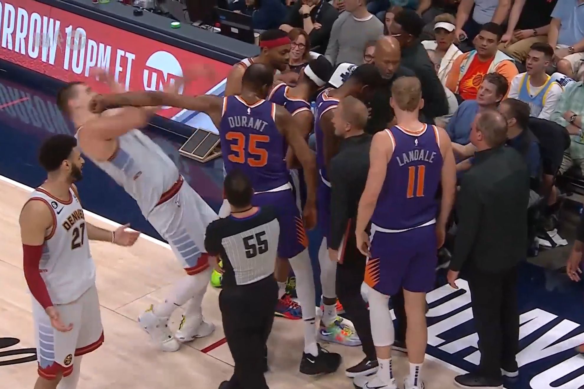 Kevin Durant shoves Jokic out the Suns huddle and receives a technical