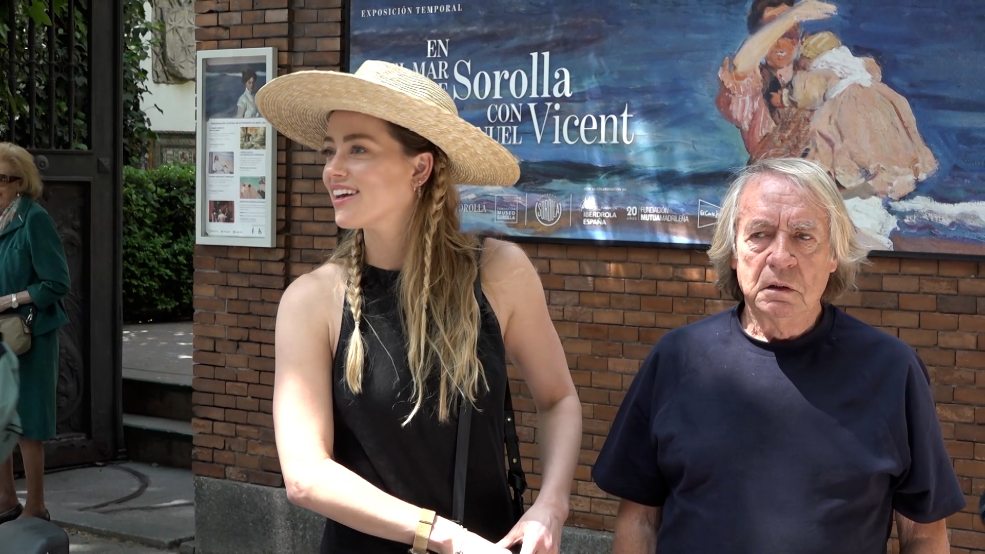 Amber Heard loving new life in Madrid: All smiles as she visits famous museum and chats with locals in Spanish