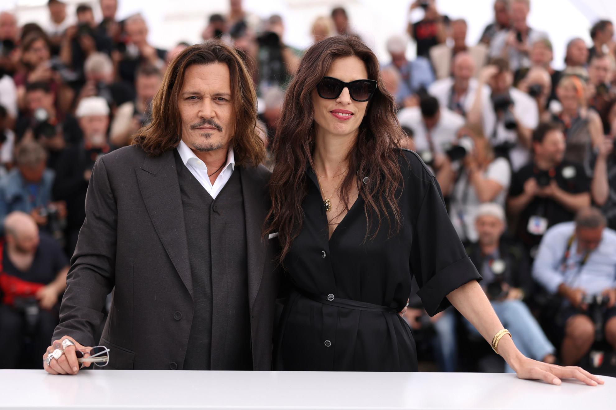 Johnny Depp, left, and director Maiwenn pose for photographers.