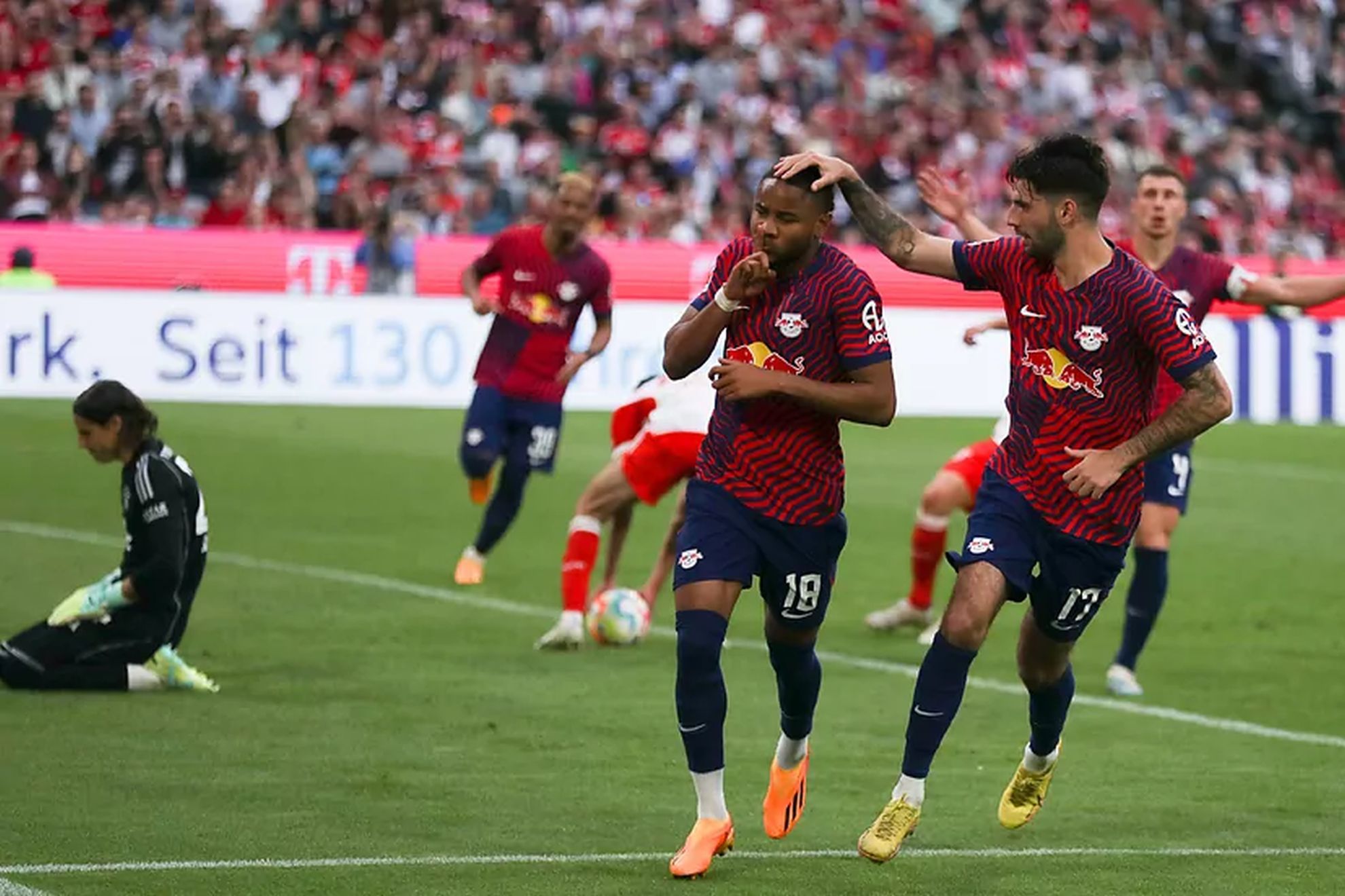 Nkunku celebrates his goal against Bayern Munich