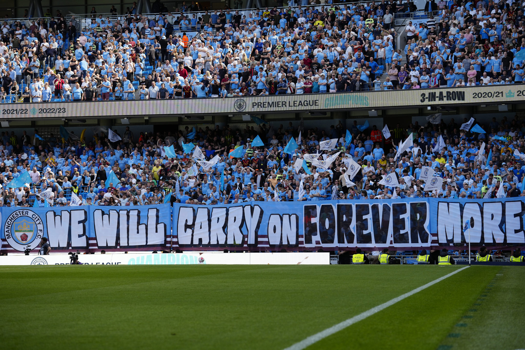 Supporters cheer before the English Premier League soccer match between  lt;HIT gt;Manchester lt;/HIT gt; City and Chelsea at the Etihad Stadium in  lt;HIT gt;Manchester lt;/HIT gt;, England, Sunday, May 21, 2023. (AP Photo/Jon Super)