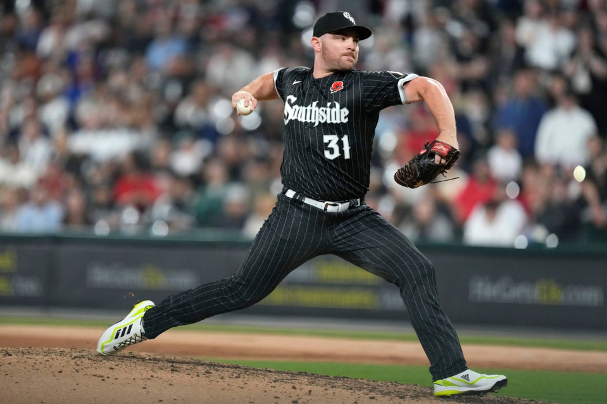 Chicago White Sox relief pitcher Liam Hendriks delivers during the eighth inning of a baseball game against the Los Angeles Angels