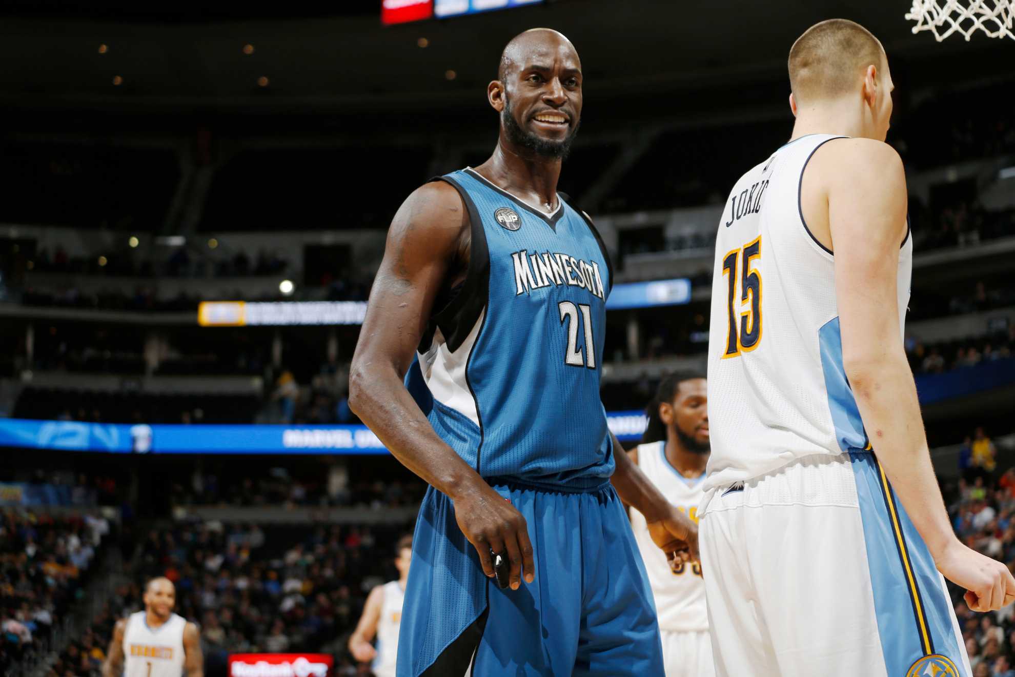 Kevin Garnett next to a young Nikola Jokic in 2015. The retired Timberwolves and Celtics great has the key to stopping the Nuggets star.