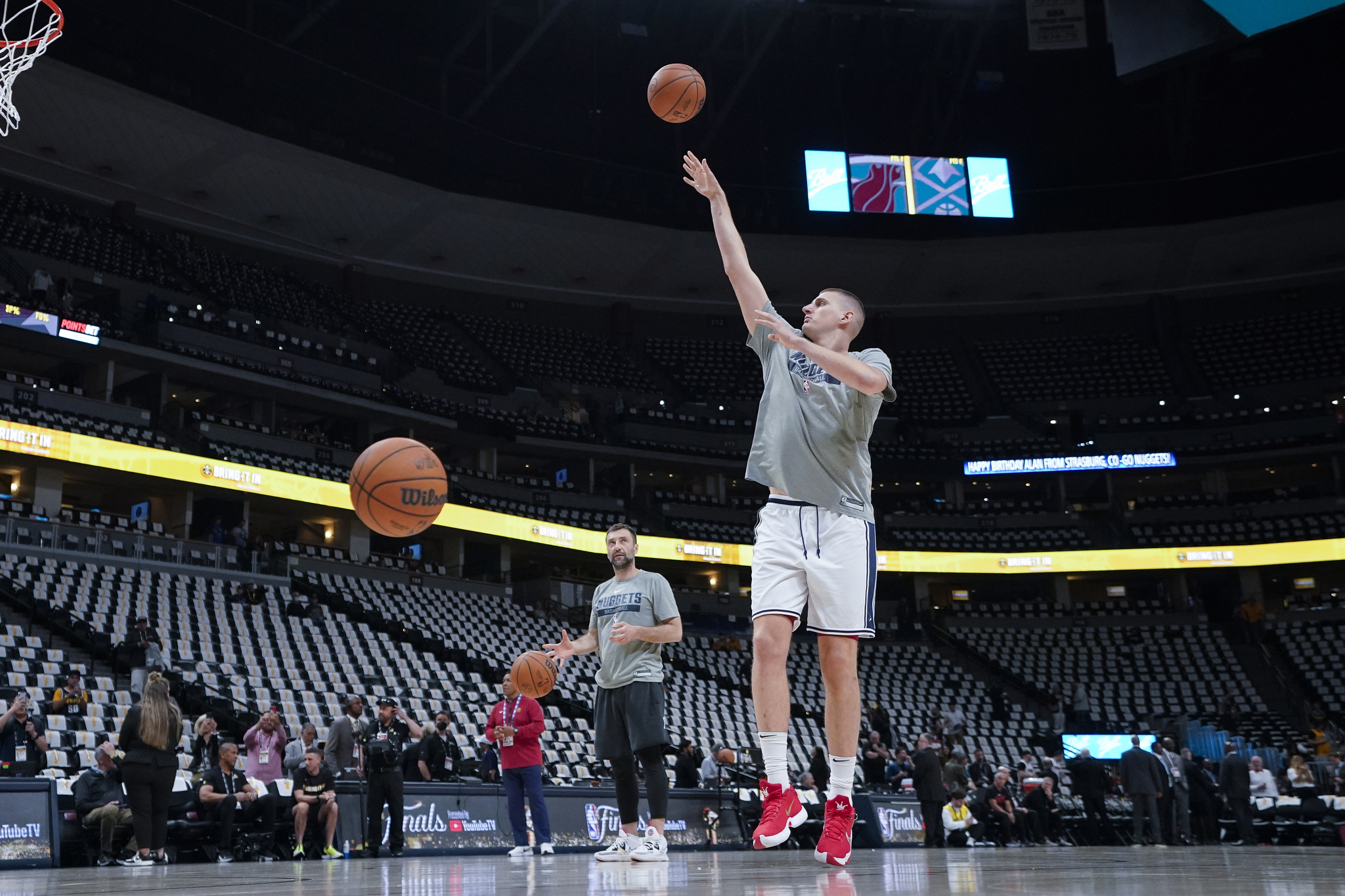  lt;HIT gt;Denver lt;/HIT gt; Nuggets center Nikola Jokic, right, warms up before Game 2 of basketball's NBA Finals against the Miami Heat, Sunday, June 4, 2023, in  lt;HIT gt;Denver lt;/HIT gt;. (AP Photo/Mark J. Terrill)