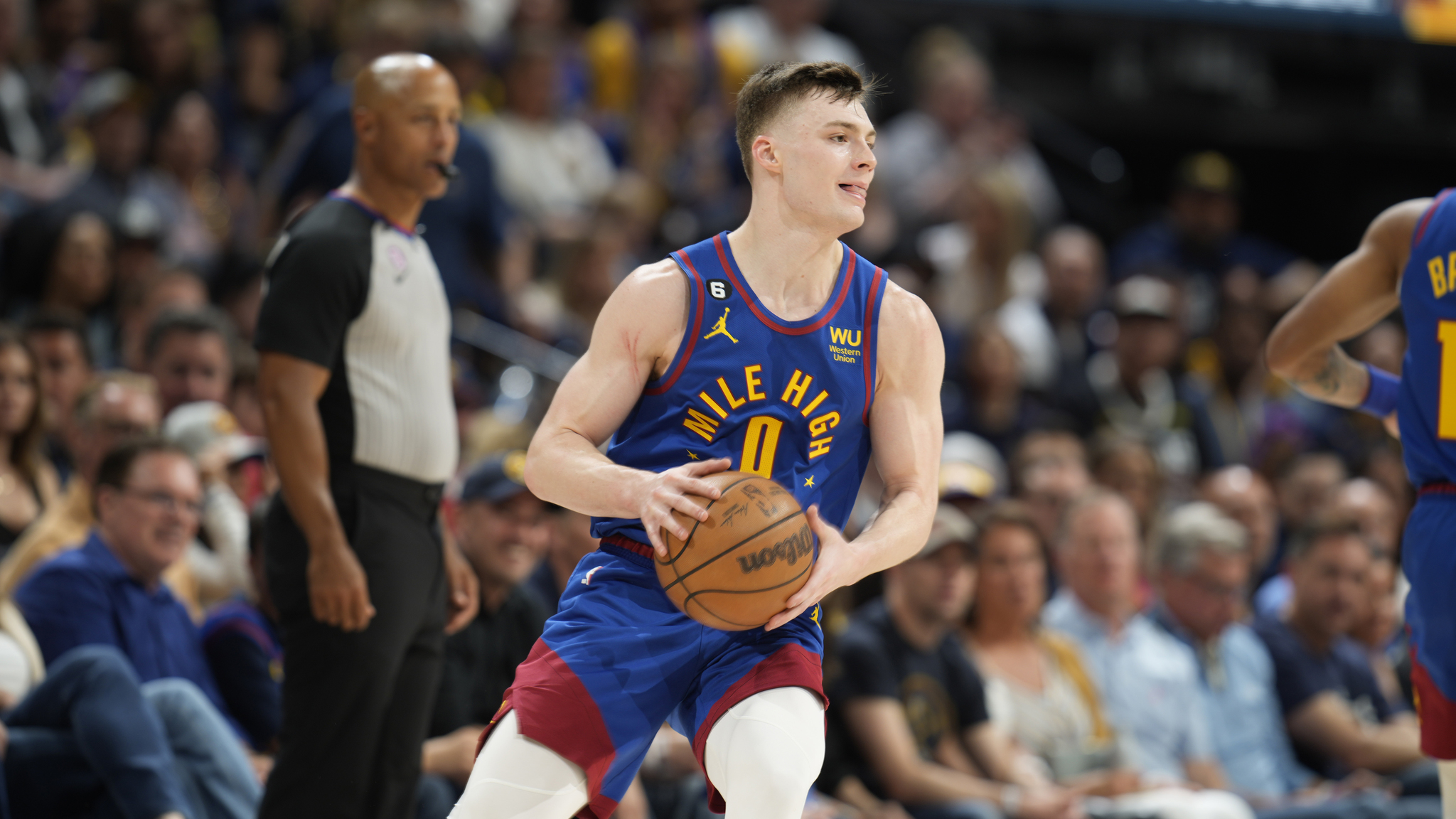 Denver Nuggets guard  lt;HIT gt;Christian lt;/HIT gt;  lt;HIT gt;Braun lt;/HIT gt; (0) in the second half of Game 1 of an NBA second-round basketball series Saturday, April 29, 2023, in Denver. (AP Photo/David Zalubowski)