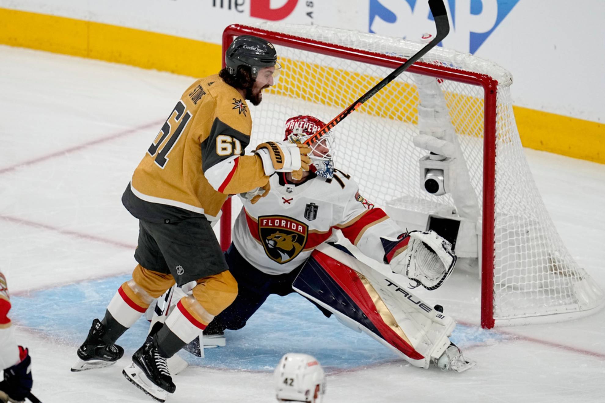 Vegas Golden Knights right wing Mark Stone (61) celebrates a goal by teammate Jonathan Marchessault as Florida Panthers goaltender Sergei Bobrovsky (72) can't make the stop