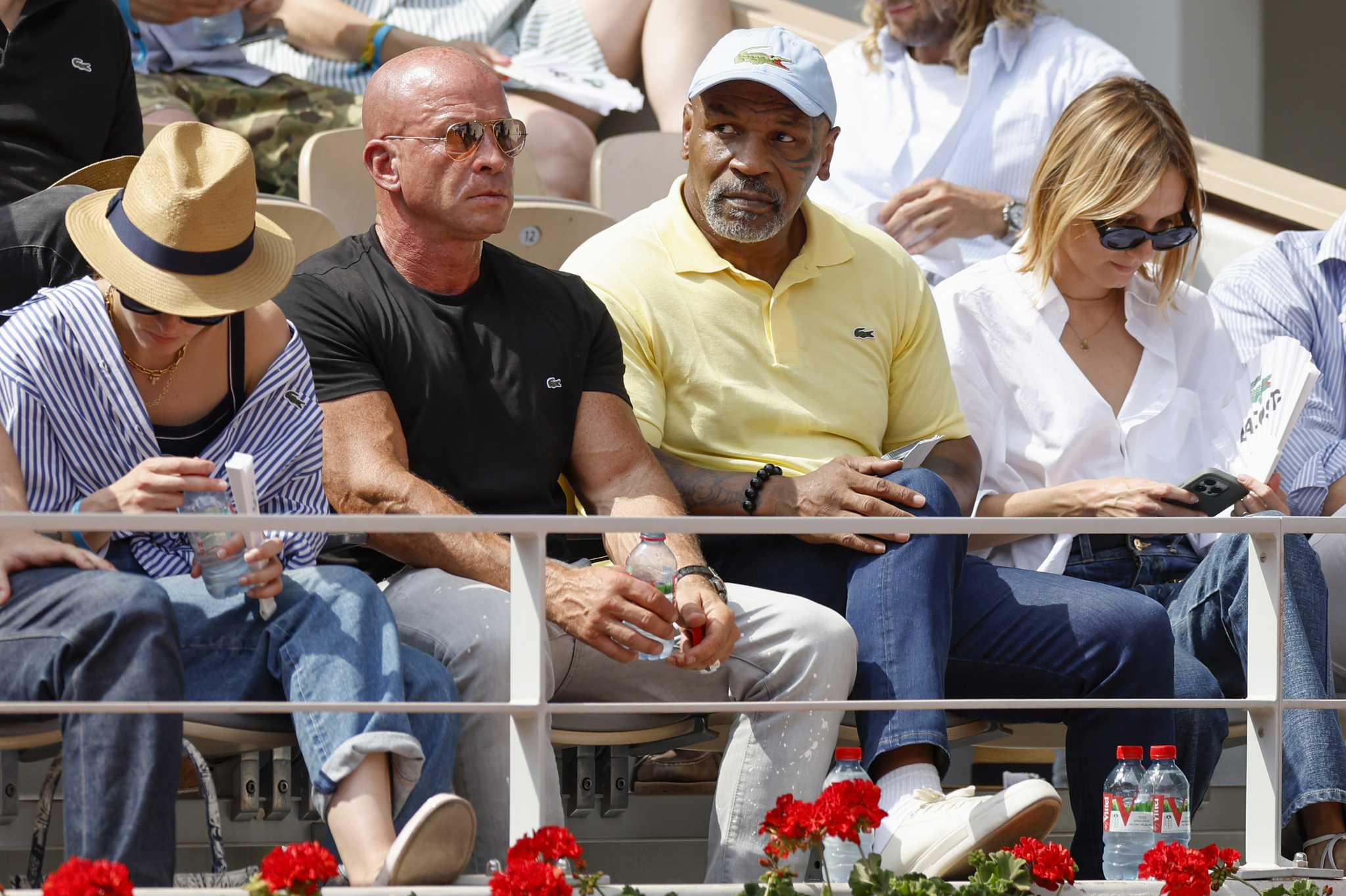 Former boxer Mike  lt;HIT gt;Tyson lt;/HIT gt;, second from right, watches the semifinal match of the French Open tennis tournament between Serbia's Novak Djokovic and Spain's Carlos Alcaraz at the Roland Garros stadium in Paris, Friday, June 9, 2023. (AP Photo/Jean-Francois Badias)during their semifinal match of the French Open tennis tournament at the Roland Garros stadium in Paris, Friday, June 9, 2023. (AP Photo/Jean-Francois Badias)