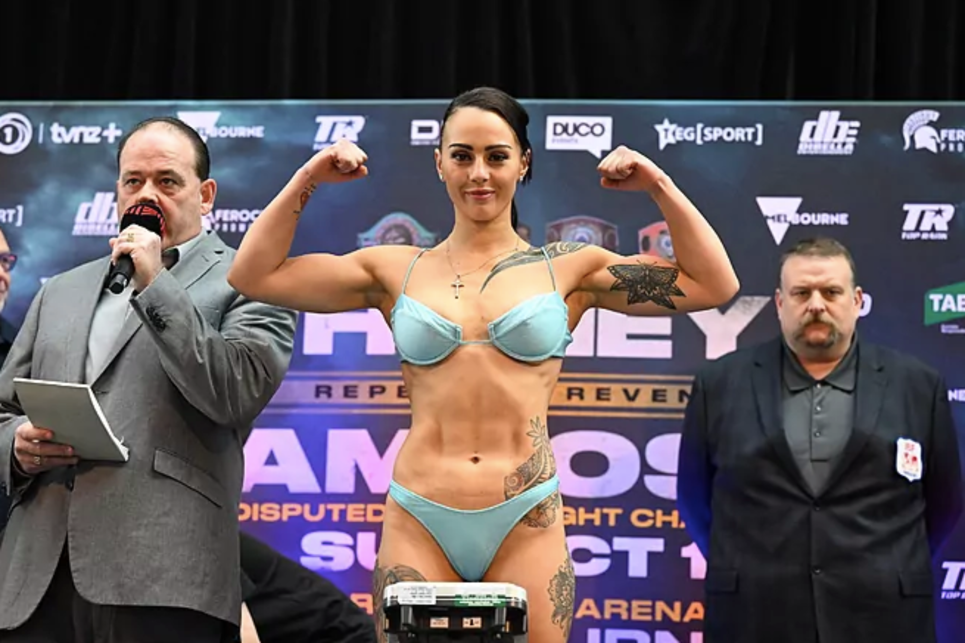 World champion Cherneka Johnson attends the weigh-in topless and covered in body paint