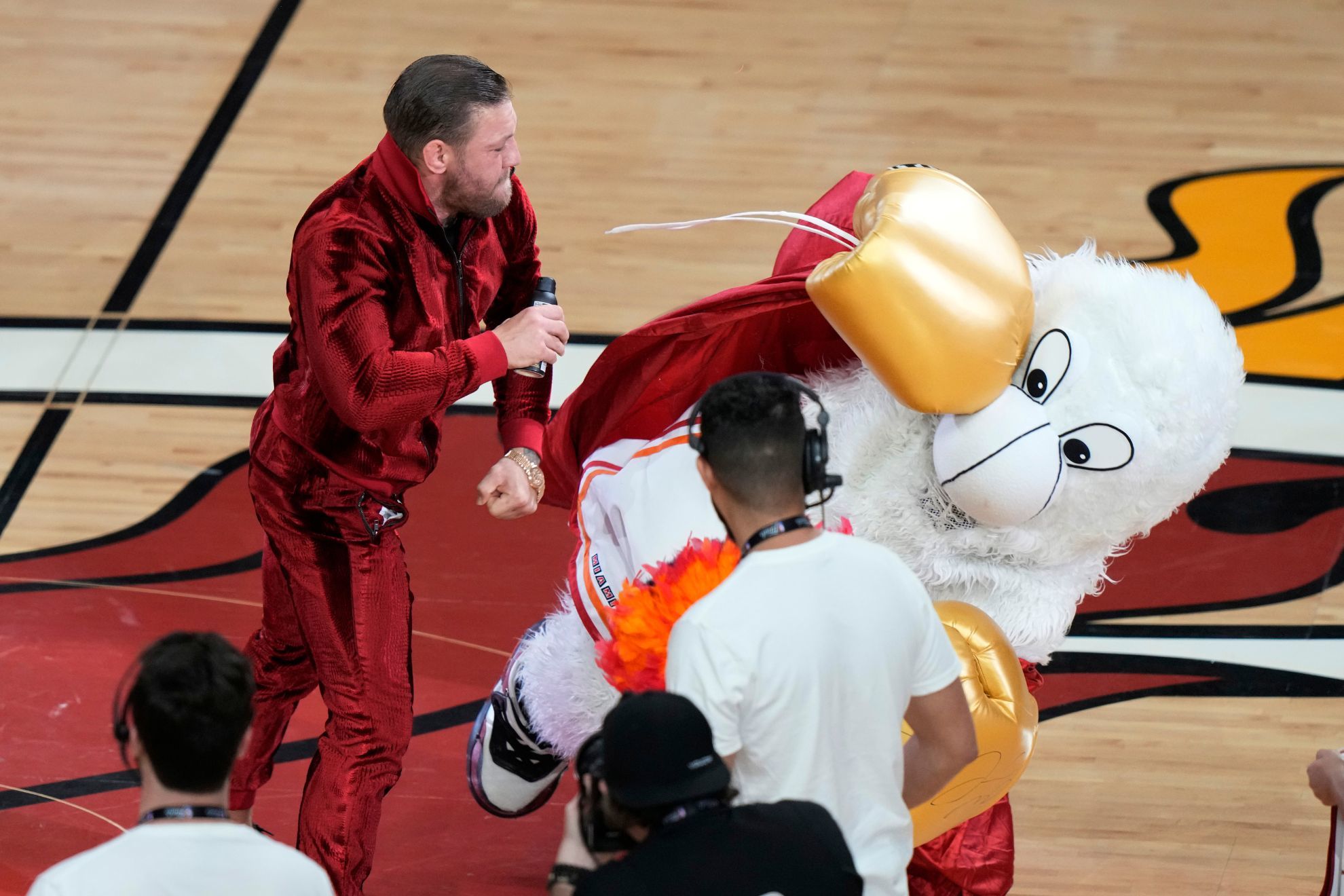Conor McGregor sends Heat mascot Burnie to ER after punching him twice