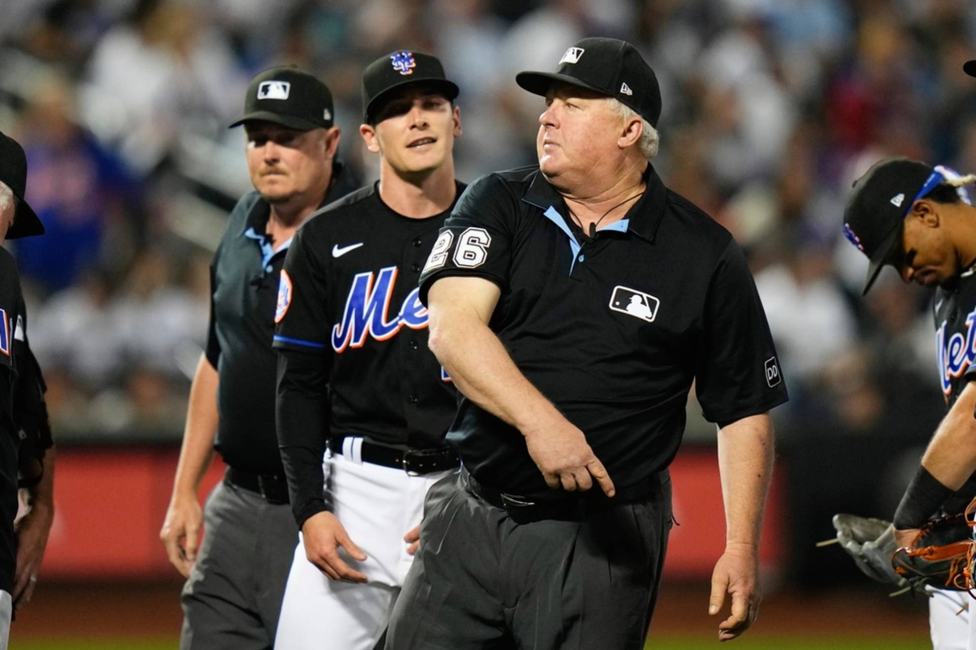 Umpire Bill Miller ejects New York Mets relief pitcher Drew Smith